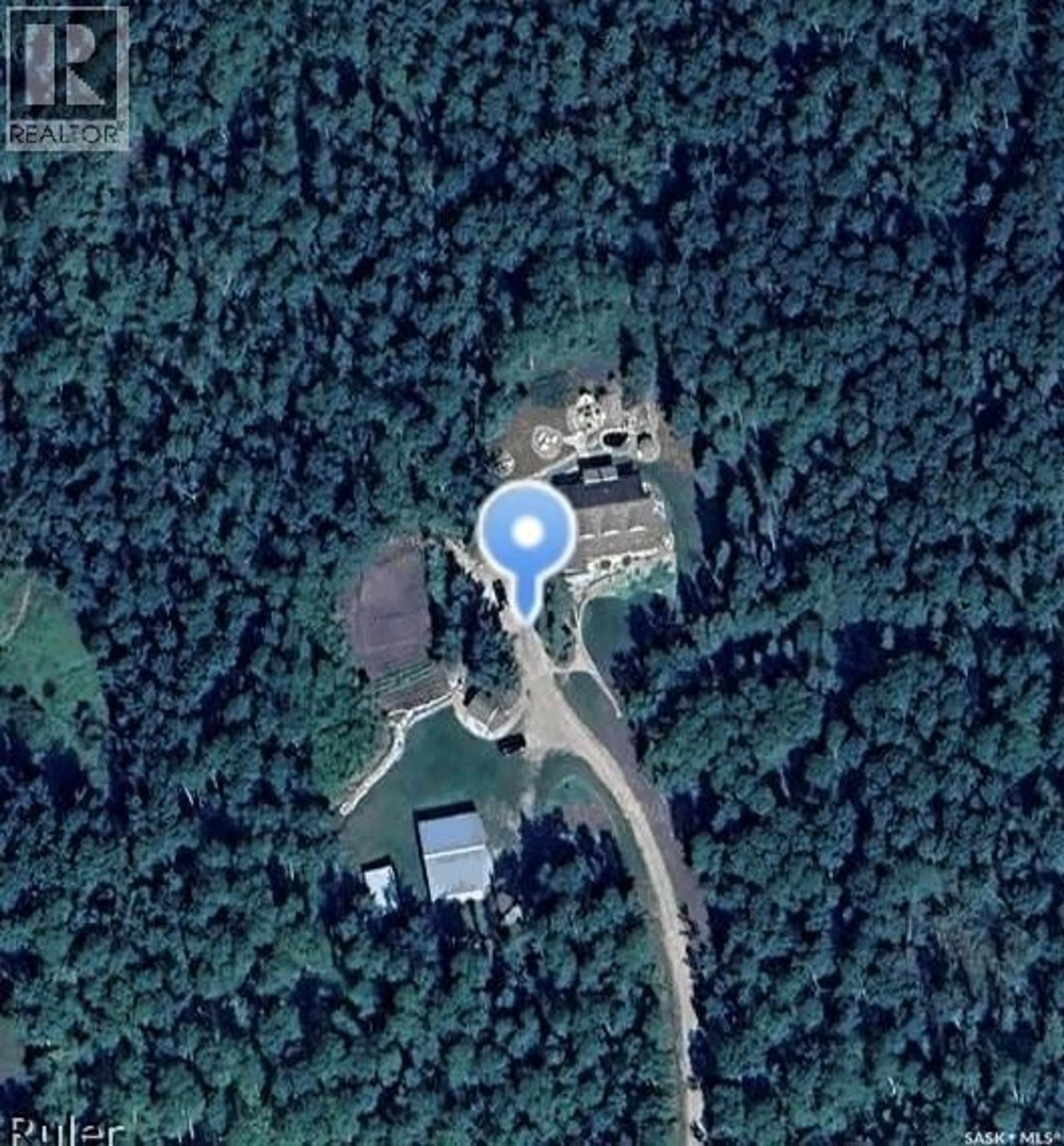 A pic from outside/outdoor area/front of a property/back of a property/a pic from drone, unknown for 4.96 ACRES MOVE IN READY PROPERTY, Hudson Bay Rm No. 394 Saskatchewan S0E0Y0