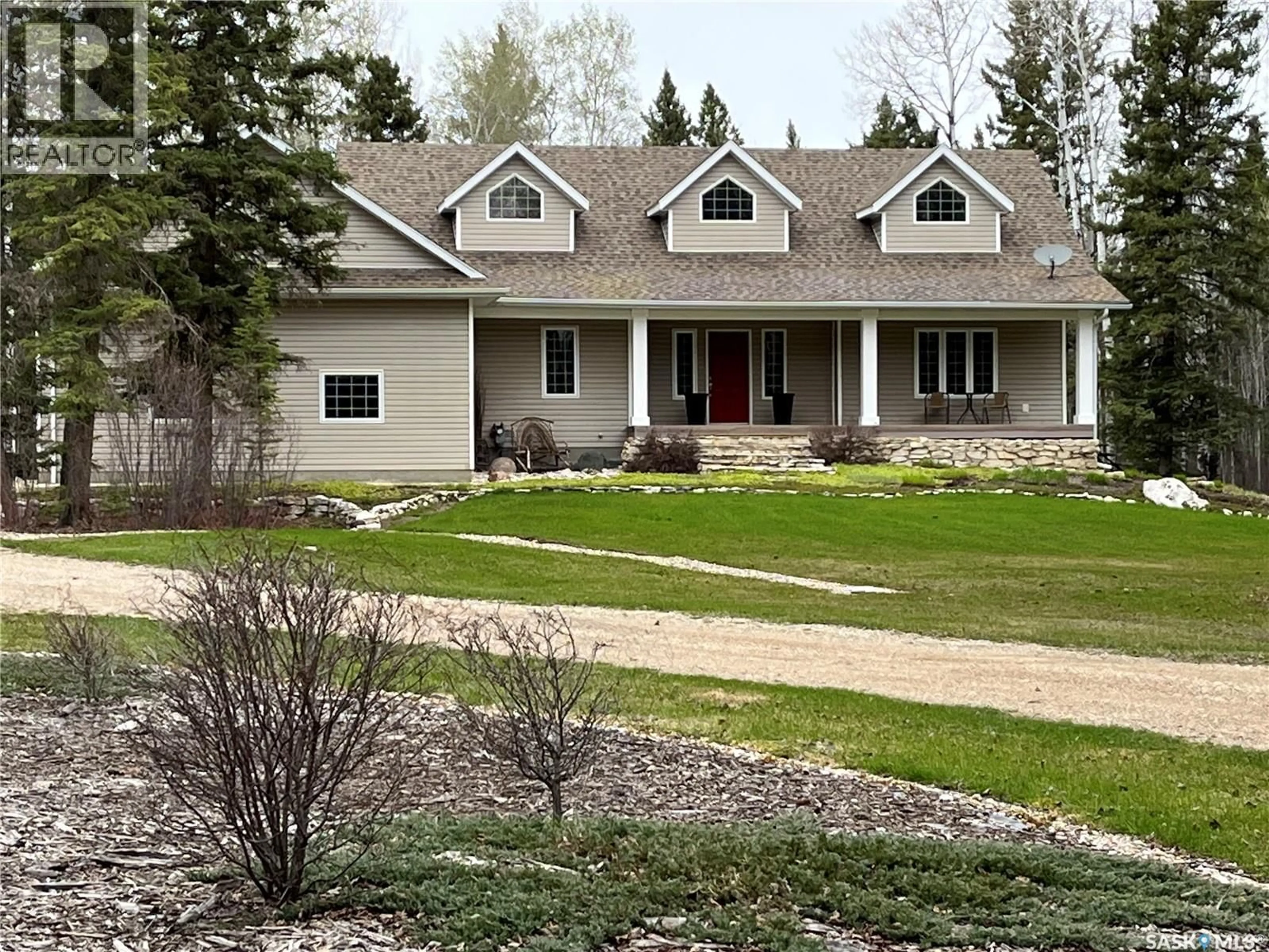 Home with vinyl exterior material, mountain view for 4.96 ACRES MOVE IN READY PROPERTY, Hudson Bay Rm No. 394 Saskatchewan S0E0Y0