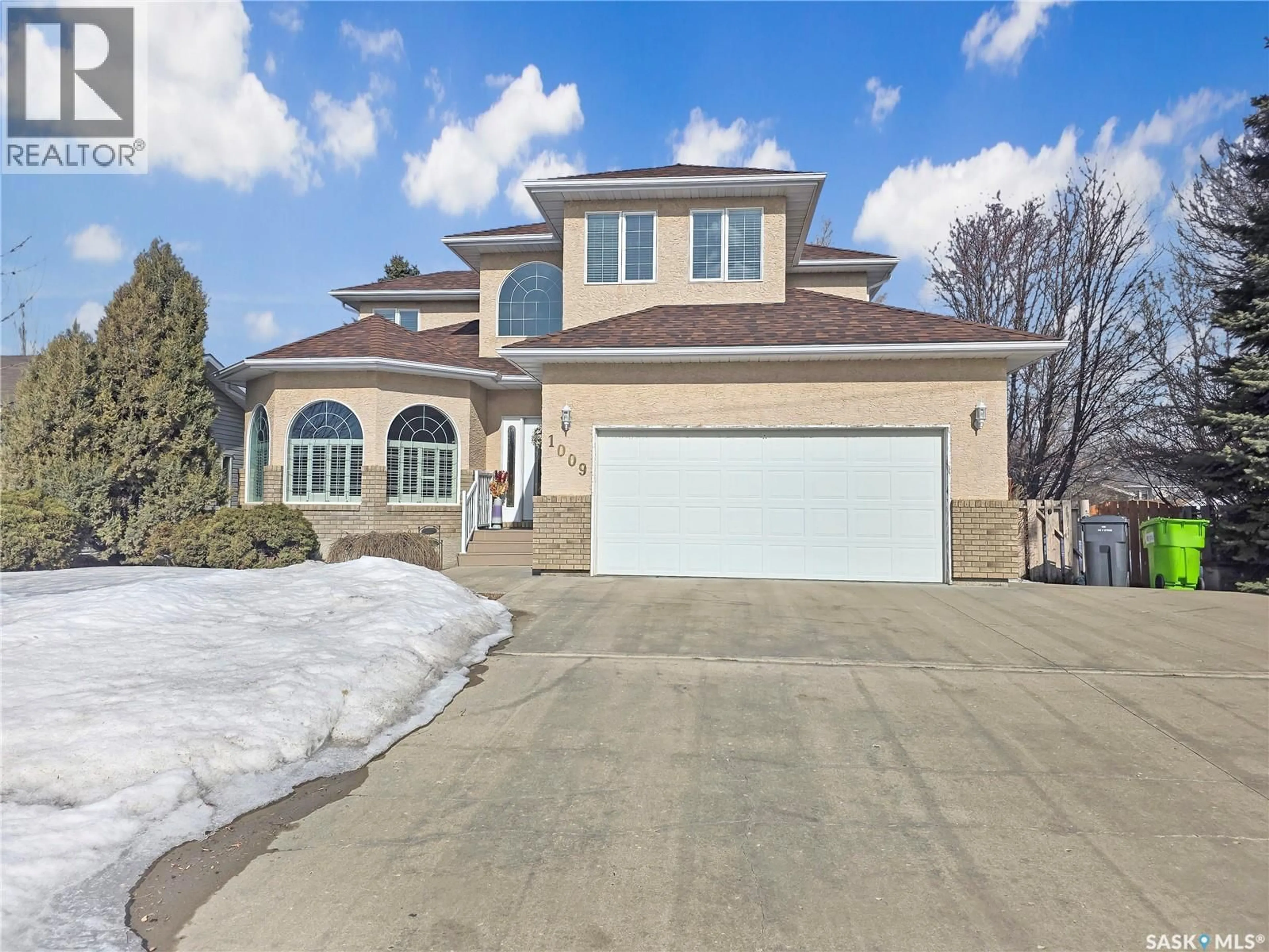 Home with brick exterior material, street for 1009 DEWDNEY STREET, Indian Head Saskatchewan S0G2K0