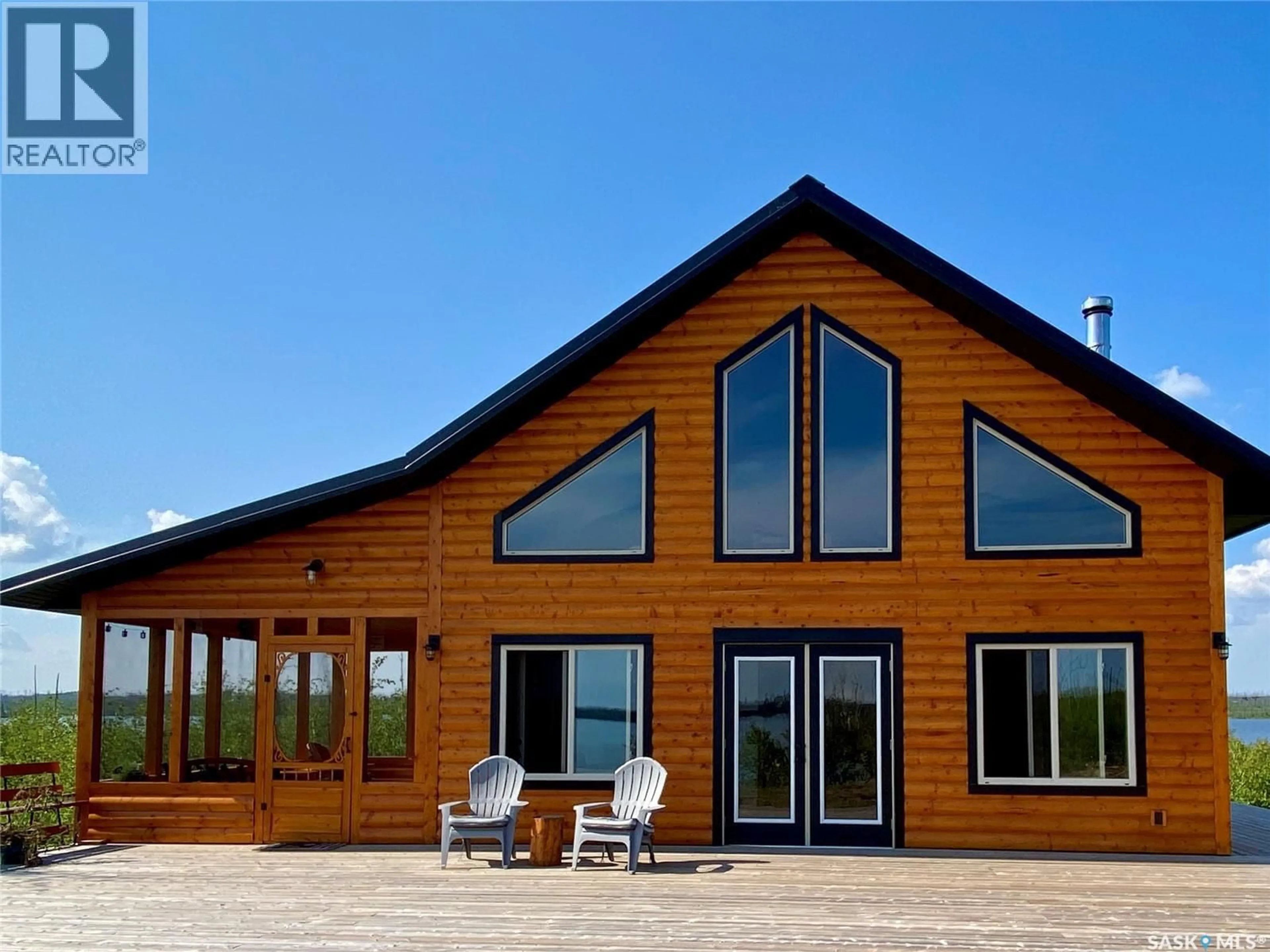 Home with vinyl exterior material, building for CABIN IN REYNOLDS BAY, Northern Admin District Saskatchewan S0J1L0