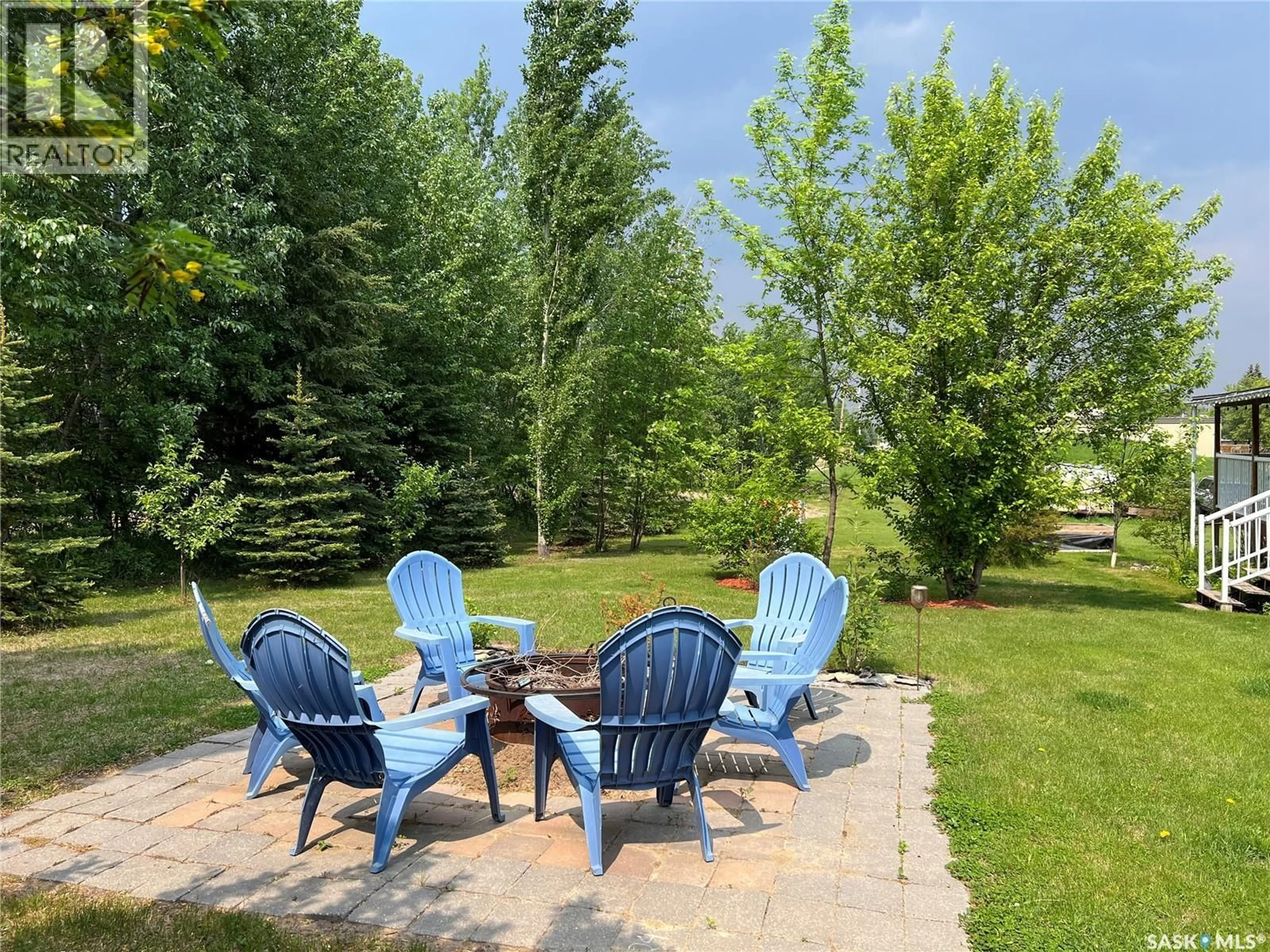 Patio, water/lake/river/ocean view for 113 2ND AVENUE, Dorintosh Saskatchewan S0M0T0