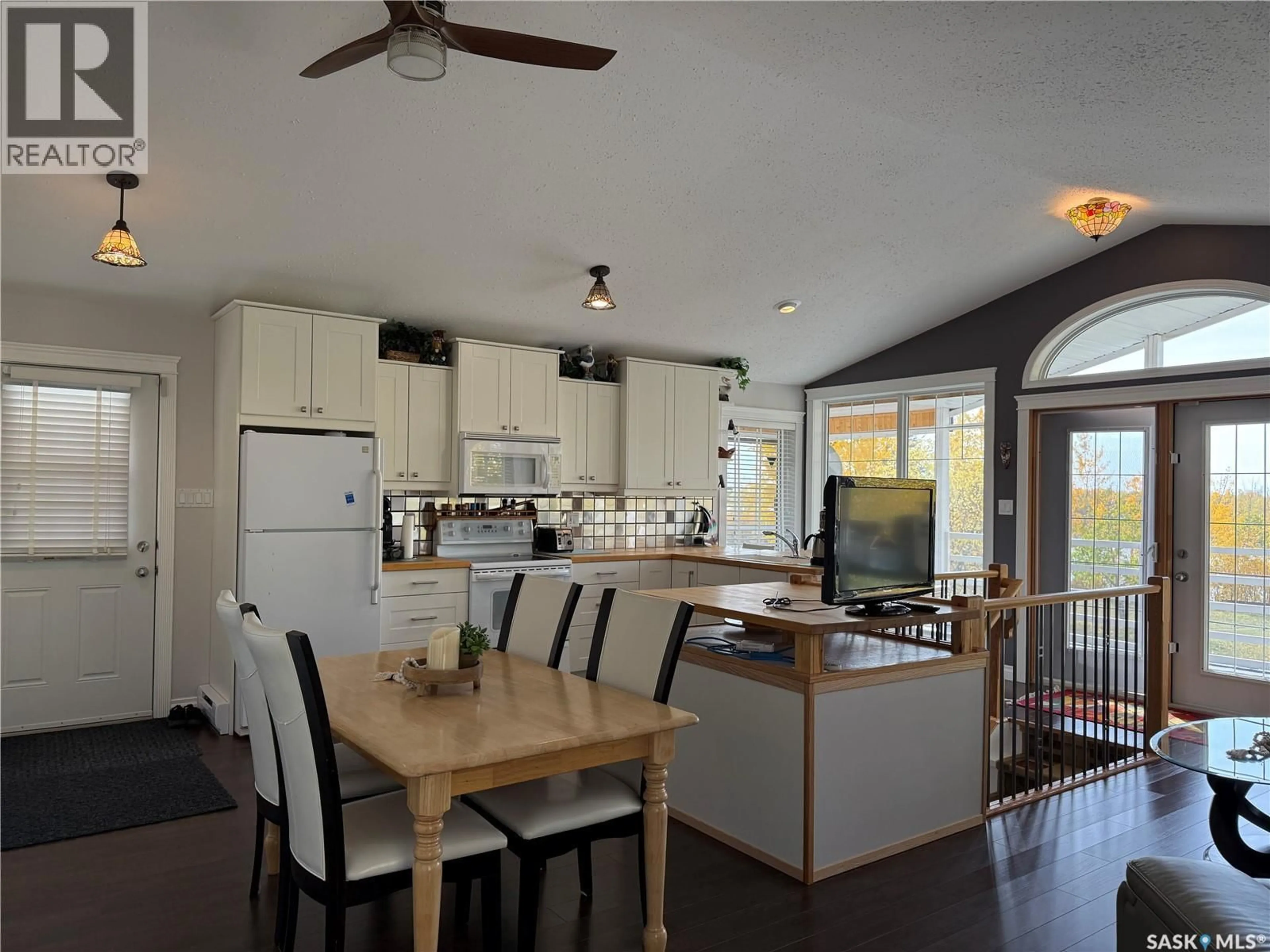 Open concept kitchen, wood/laminate floor for 112 MIDGET ROAD, Buffalo Narrows Saskatchewan S0M0J0