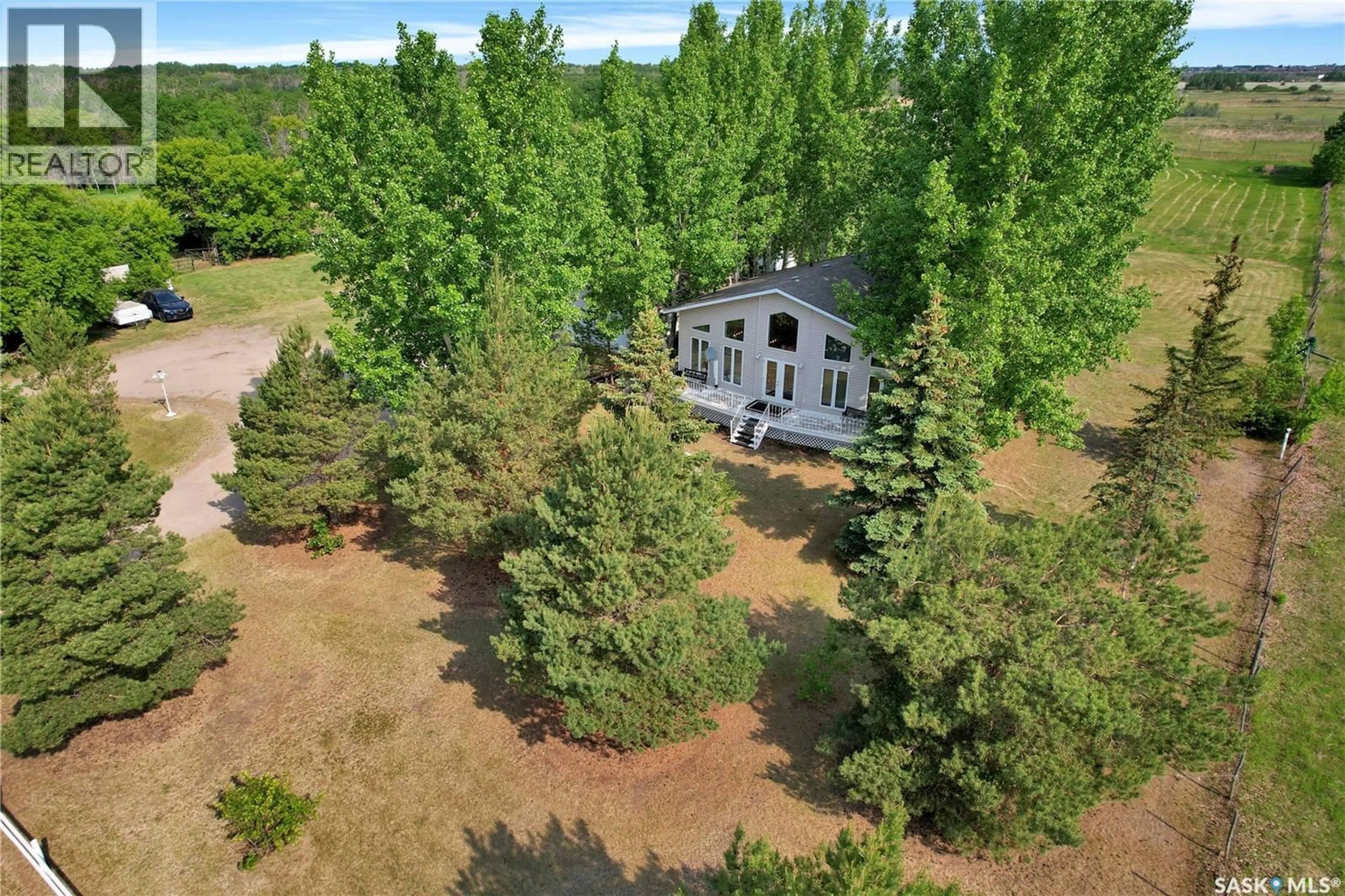 A pic from outside/outdoor area/front of a property/back of a property/a pic from drone, forest/trees view for 1675 GRASSWOOD ROAD, Corman Park Rm No. 344 Saskatchewan S7K1M2