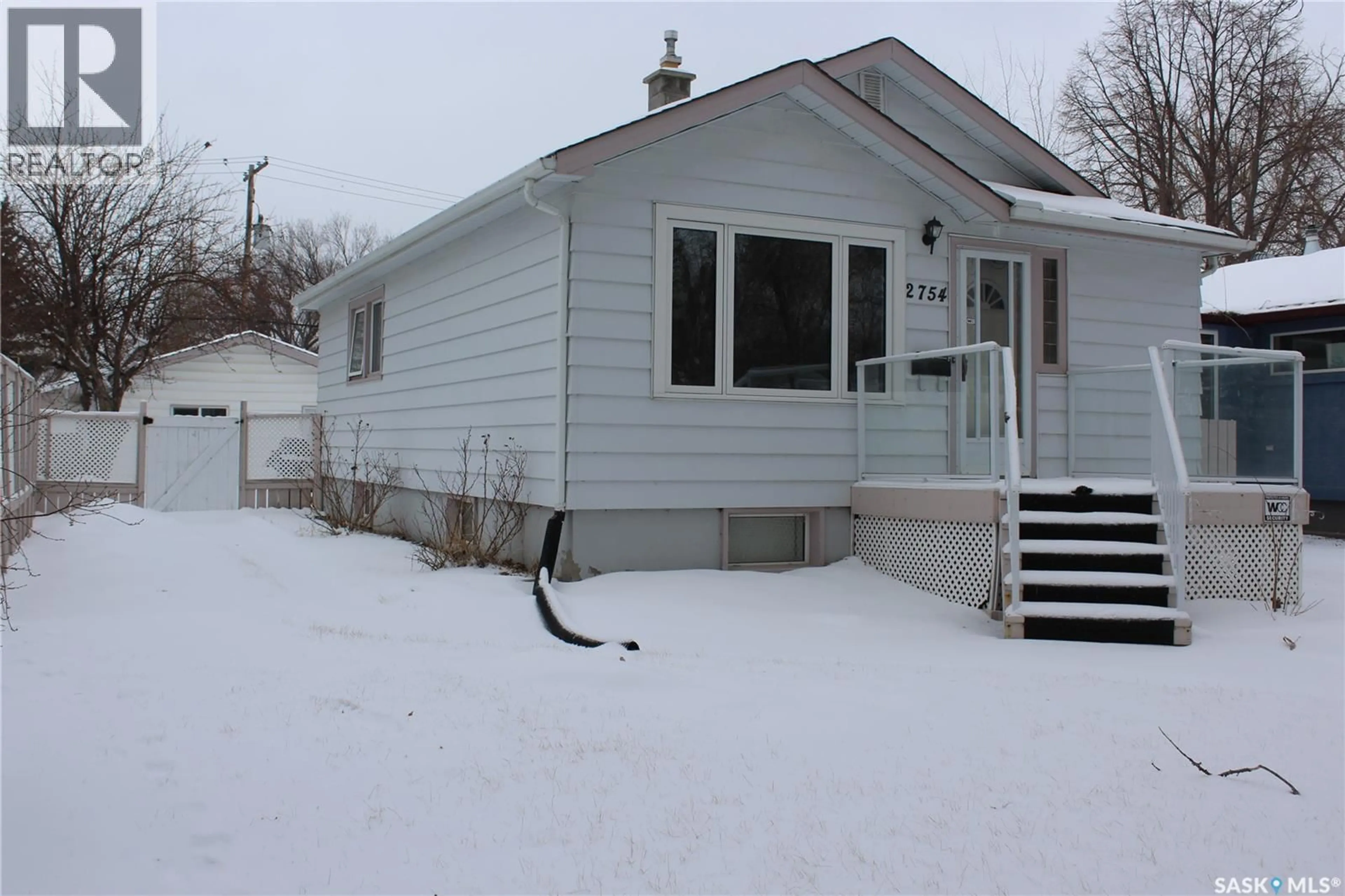 Home with vinyl exterior material, street for 2754 MCARA STREET, Regina Saskatchewan S4N2X1