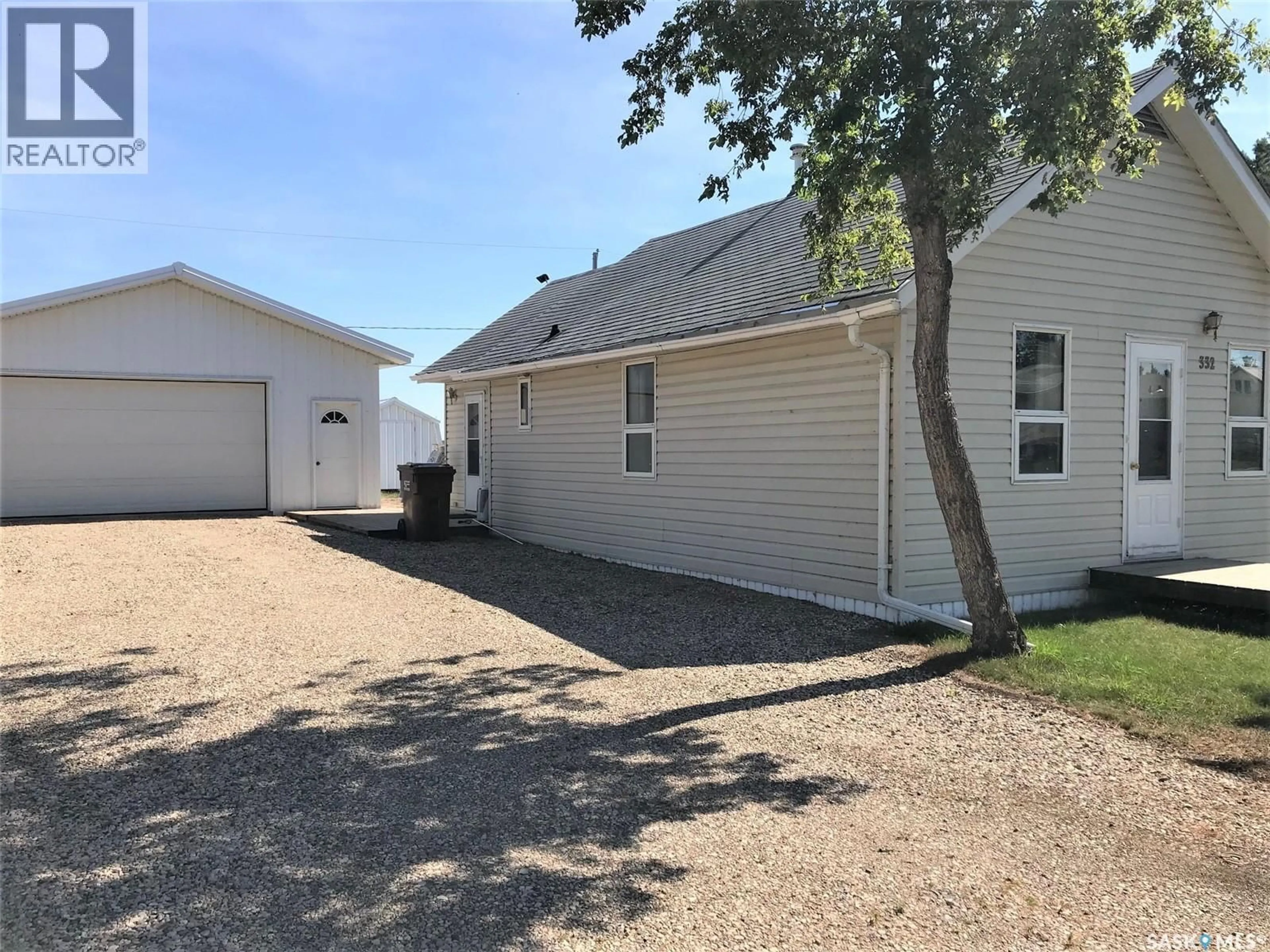 Home with vinyl exterior material, street for 332 RUTTLE AVENUE, Kinistino Saskatchewan S0J1H0