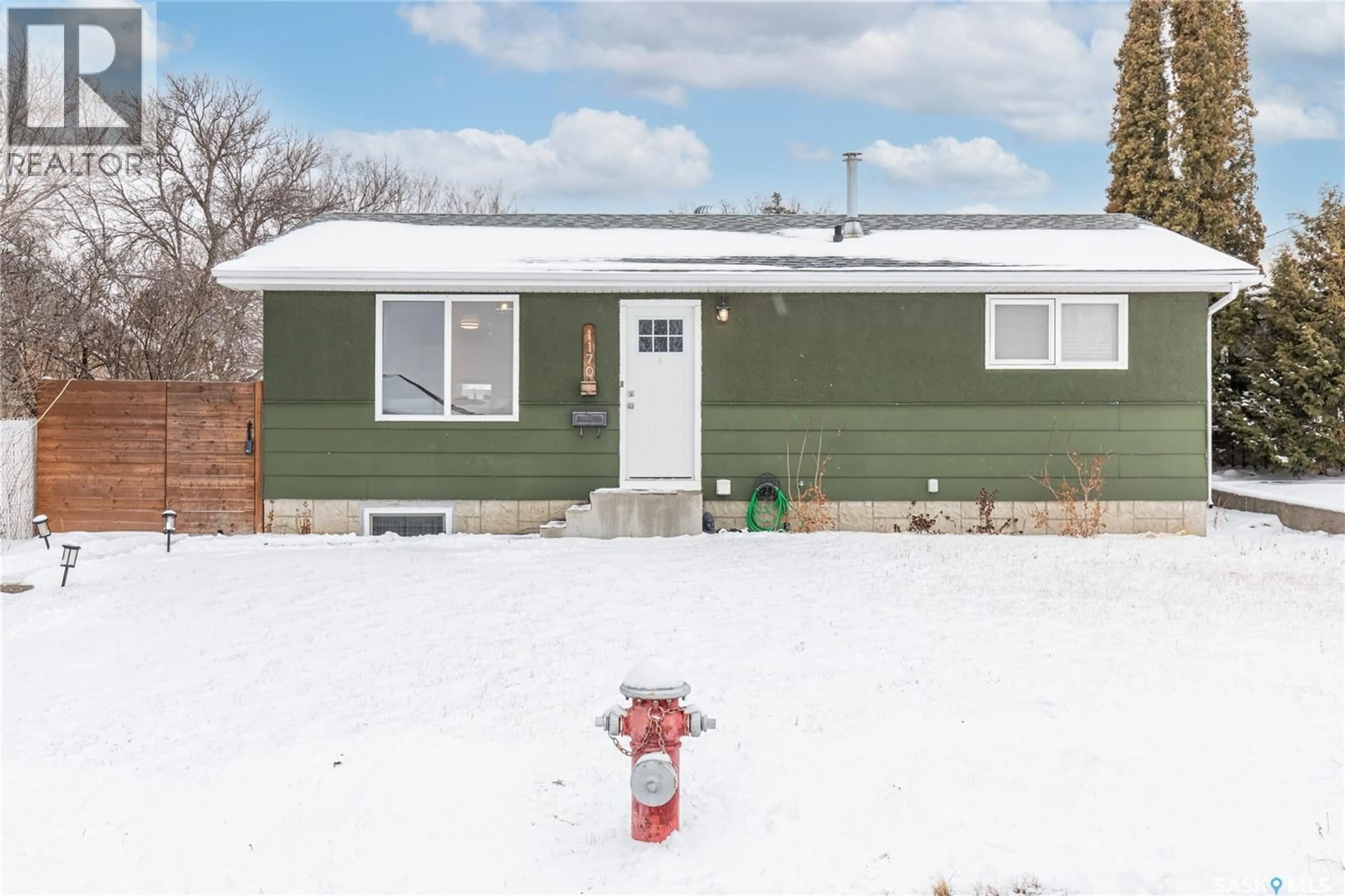 Home with vinyl exterior material, street for 1170 5TH AVENUE, Moose Jaw Saskatchewan S6H1K8