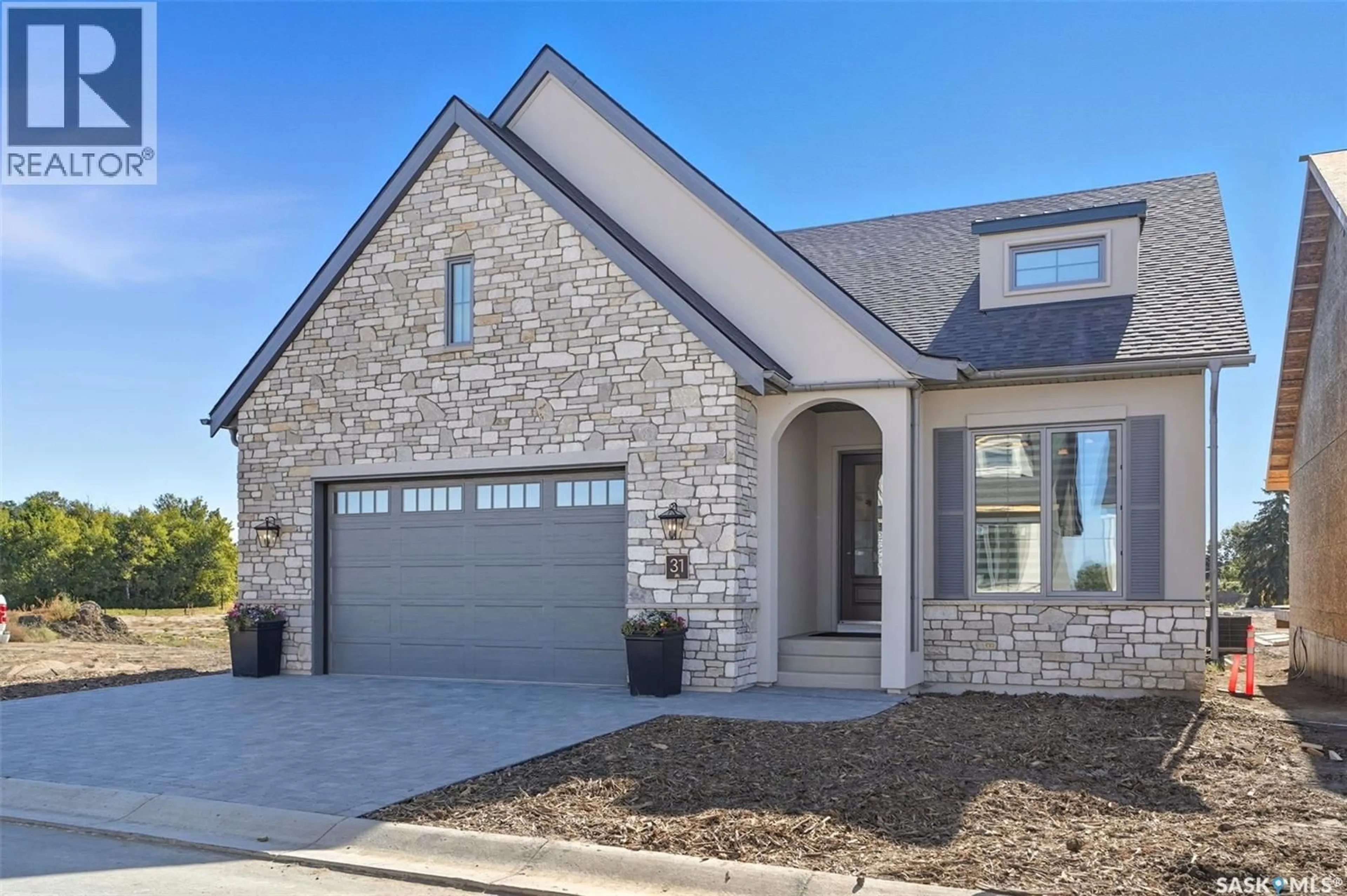 Home with brick exterior material, street for 31 350 CARTWRIGHT STREET, Saskatoon Saskatchewan S7T1B1