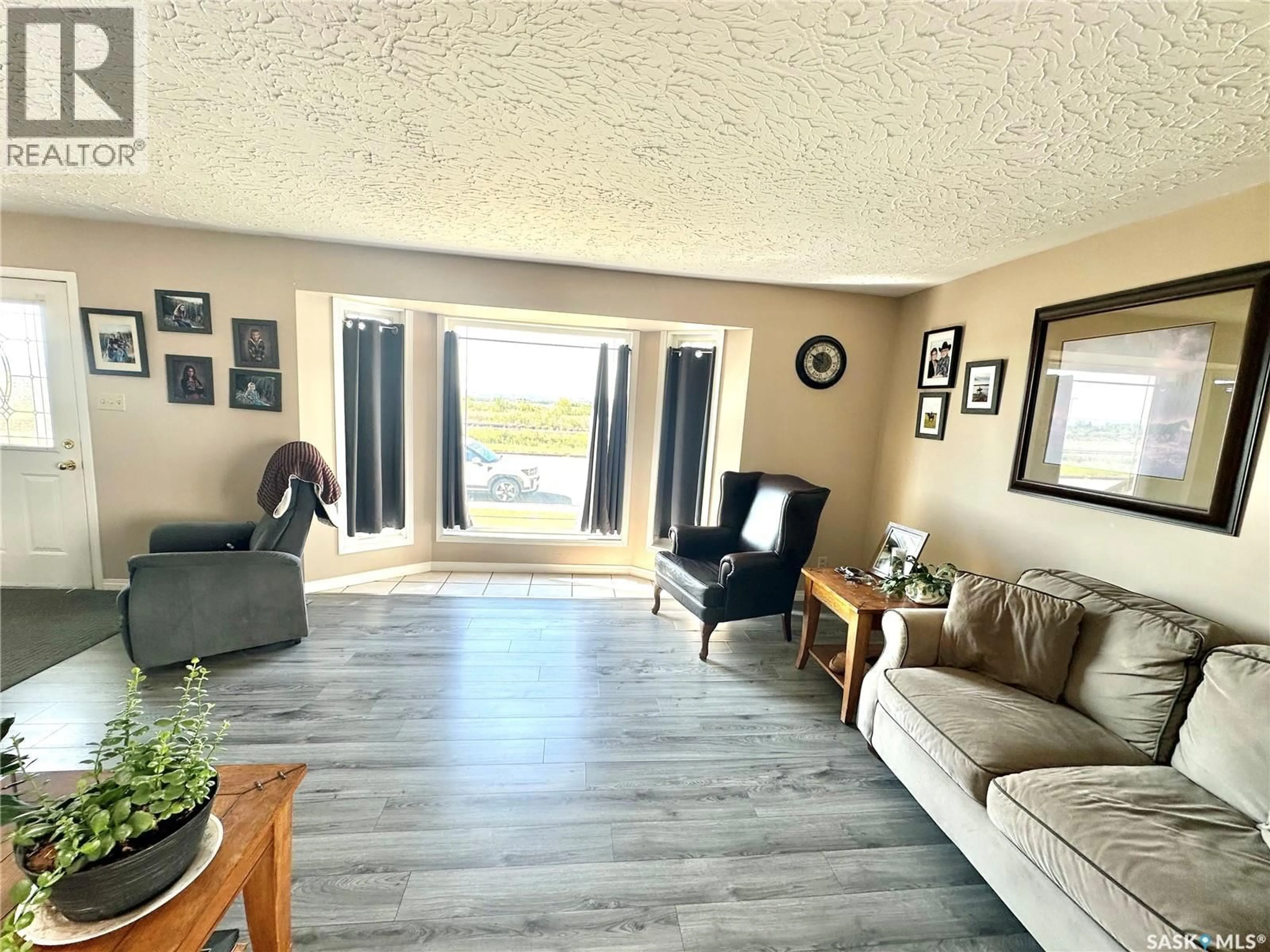 Living room with furniture, unknown for 1222 96TH STREET, North Battleford Saskatchewan S9A0H1