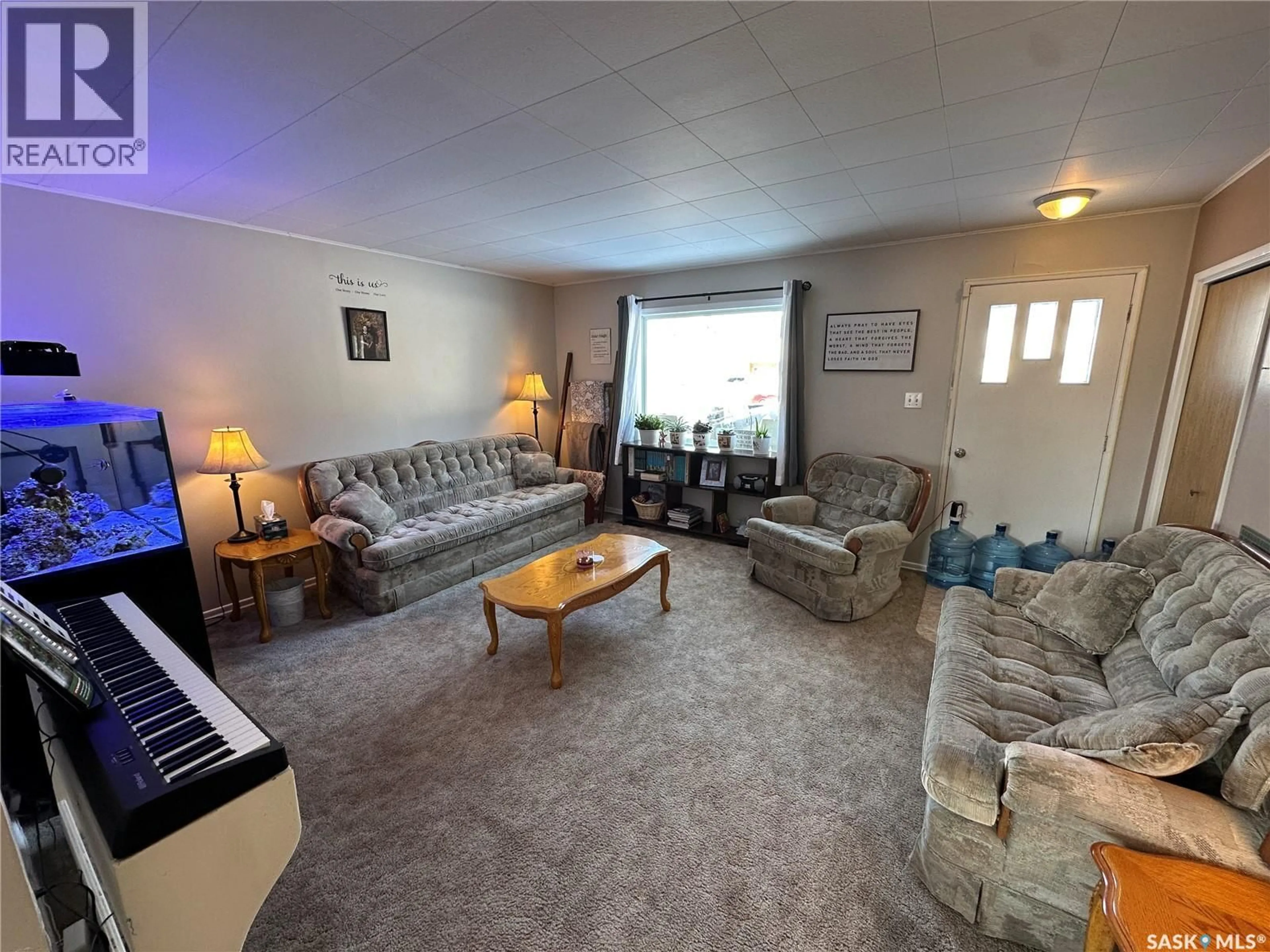 Living room with furniture, unknown for 425 3RD STREET, Duck Lake Saskatchewan S0K1J0