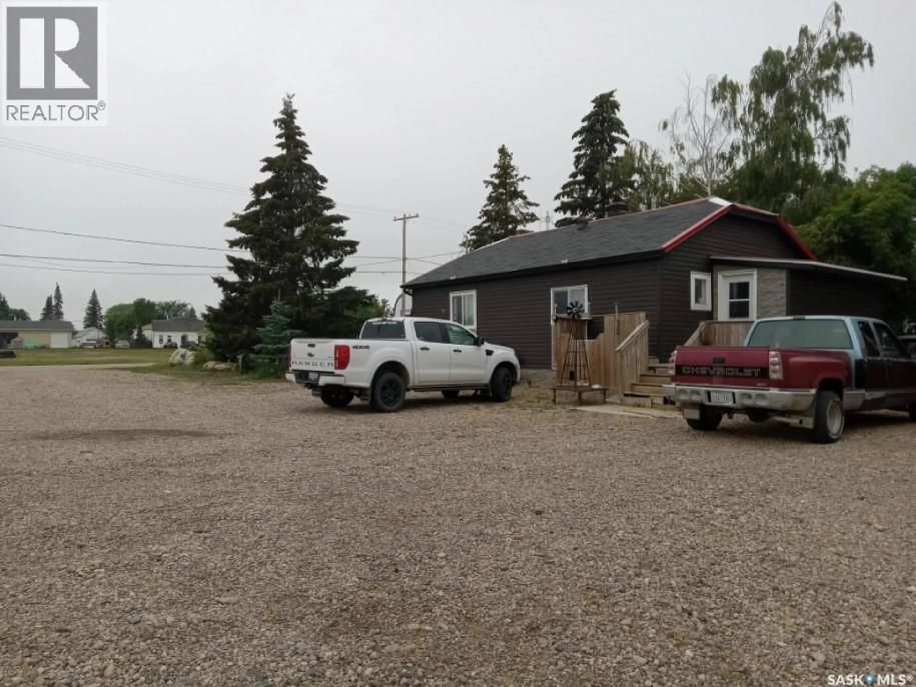 A pic from outside/outdoor area/front of a property/back of a property/a pic from drone, street for 99 DZIENDZIELOWSKI AVENUE, Cudworth Saskatchewan S0K1B0