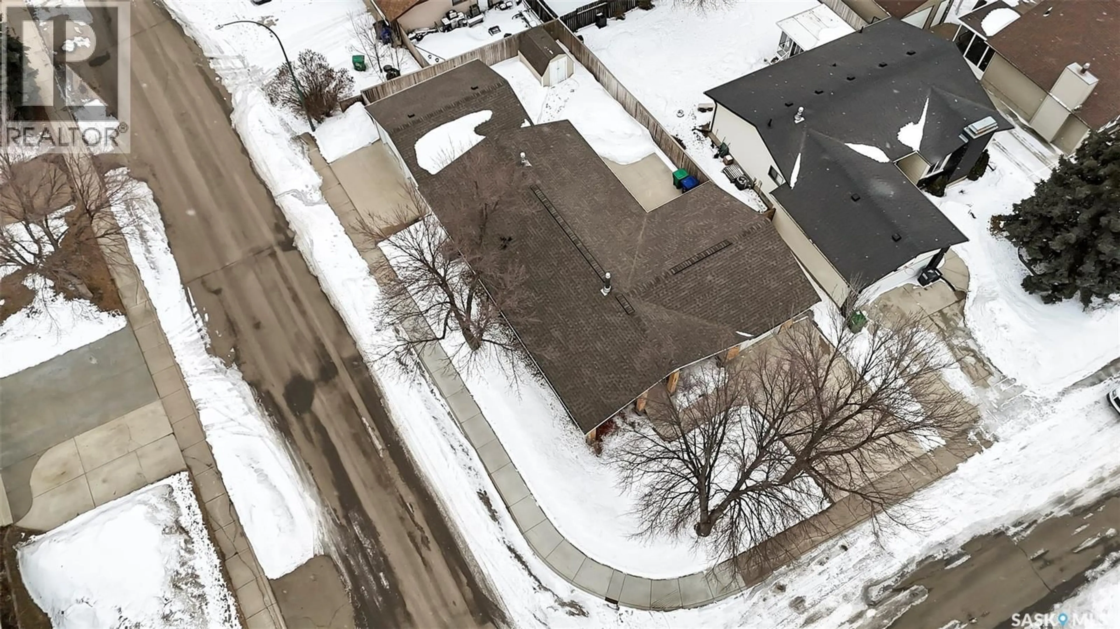 A pic from outside/outdoor area/front of a property/back of a property/a pic from drone, street for 463 DAVID KNIGHT LANE, Saskatoon Saskatchewan S7K5M1