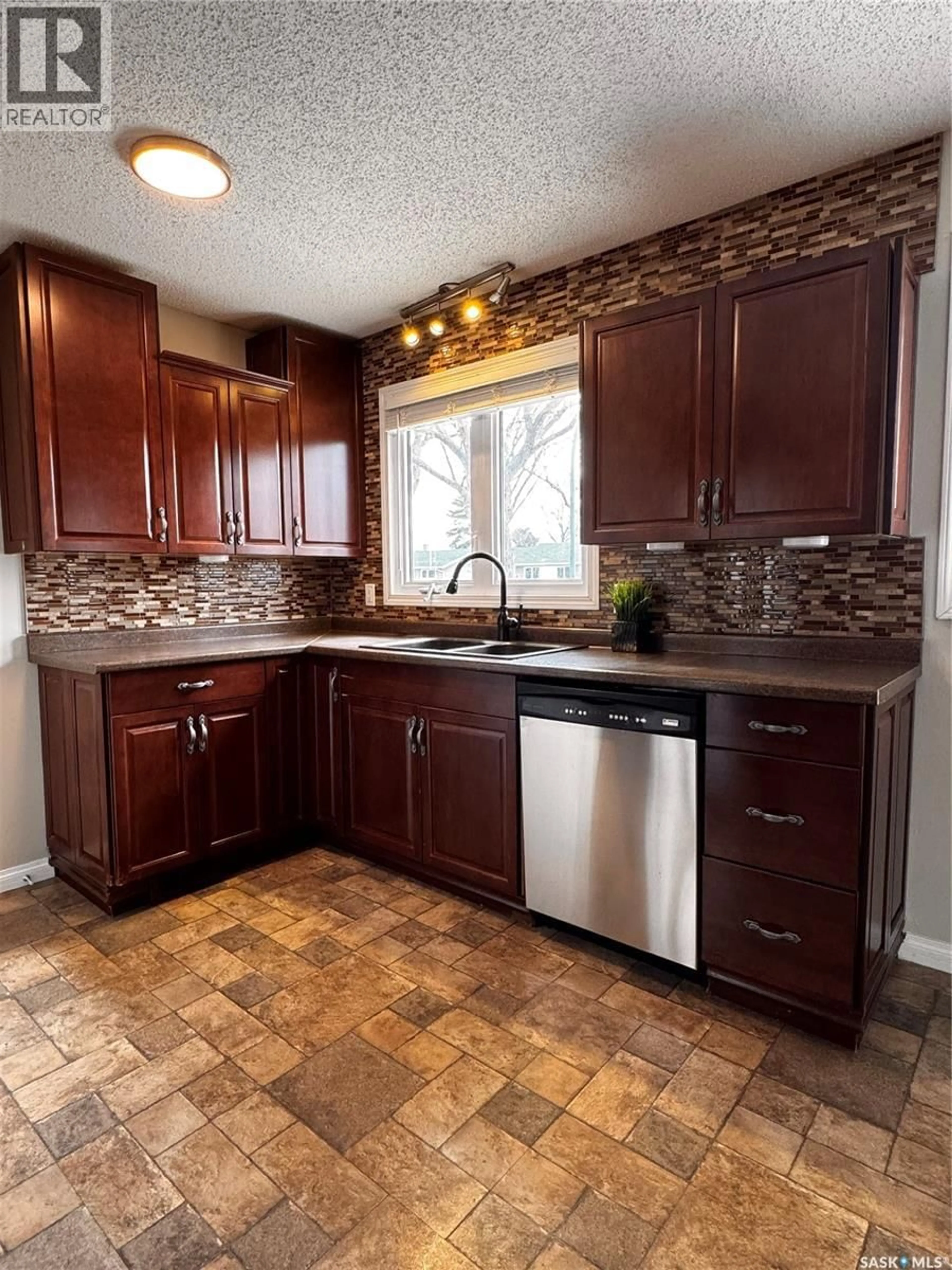 Unknown for 515 3RD AVENUE, Weyburn Saskatchewan S4H1R2