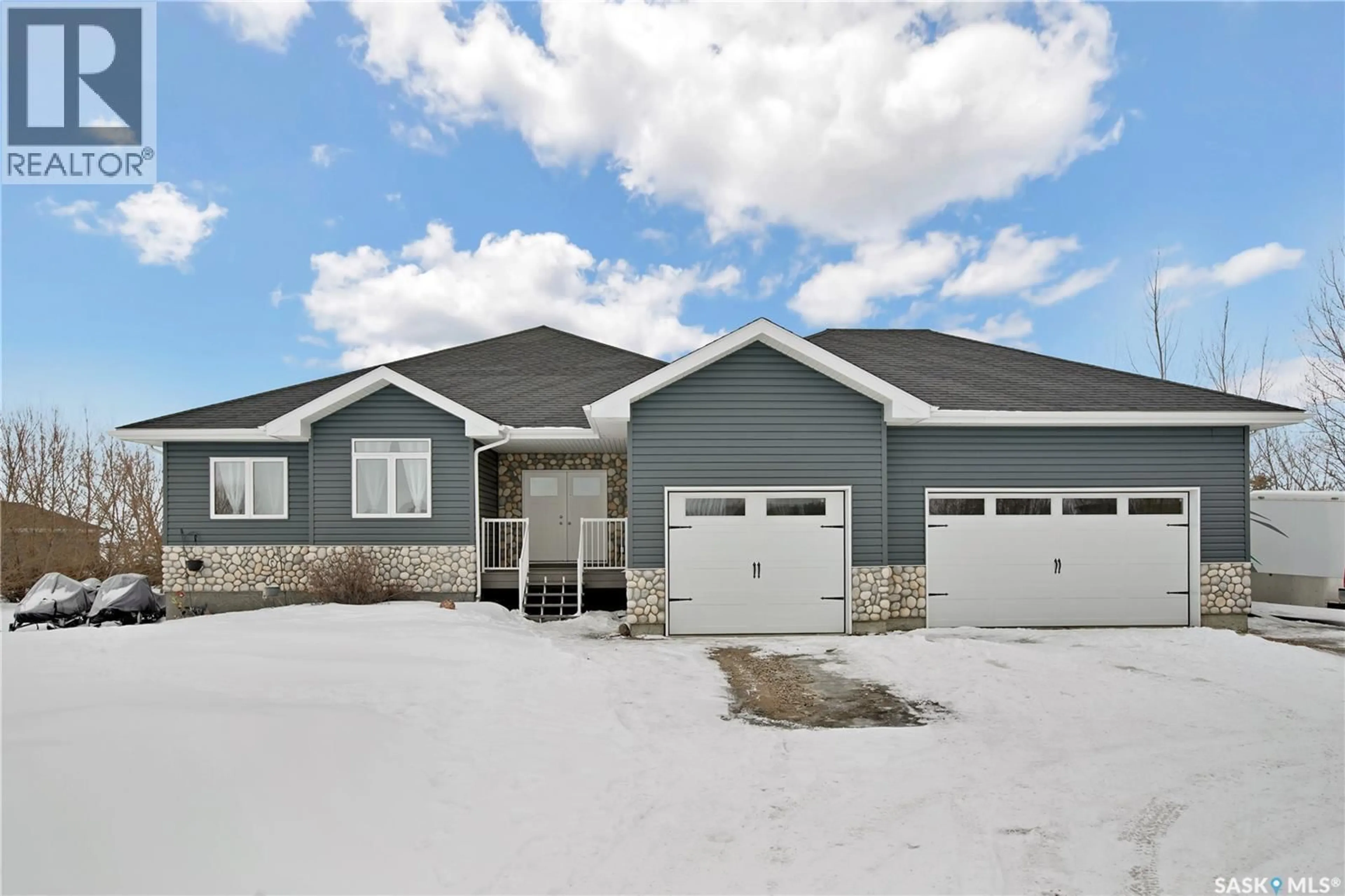 Home with vinyl exterior material, street for 15 KRAHN LANE, Rosthern Rm No. 403 Saskatchewan S0K1X1