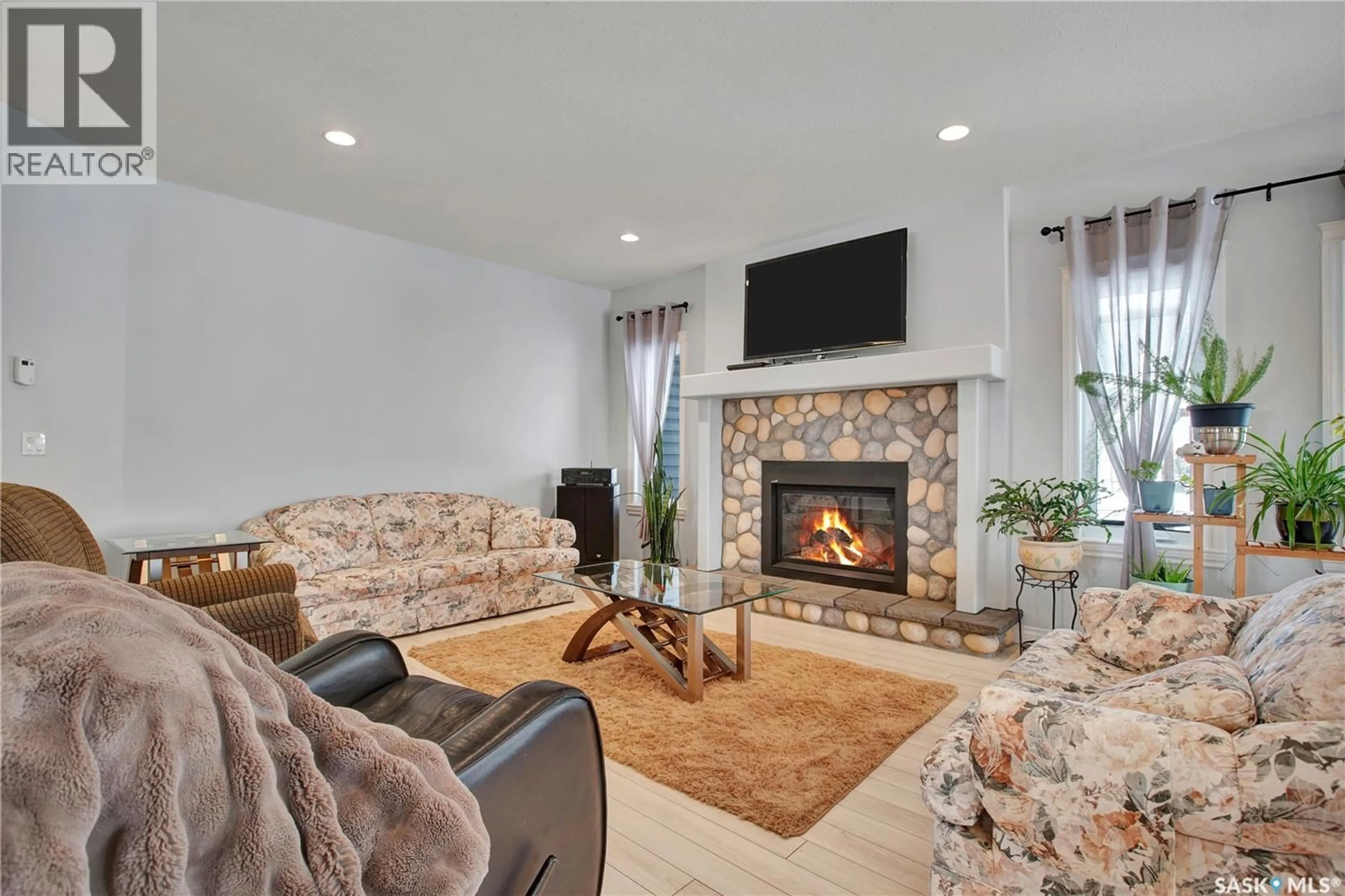 Living room with furniture, ceramic/tile floor for 15 KRAHN LANE, Rosthern Rm No. 403 Saskatchewan S0K1X1