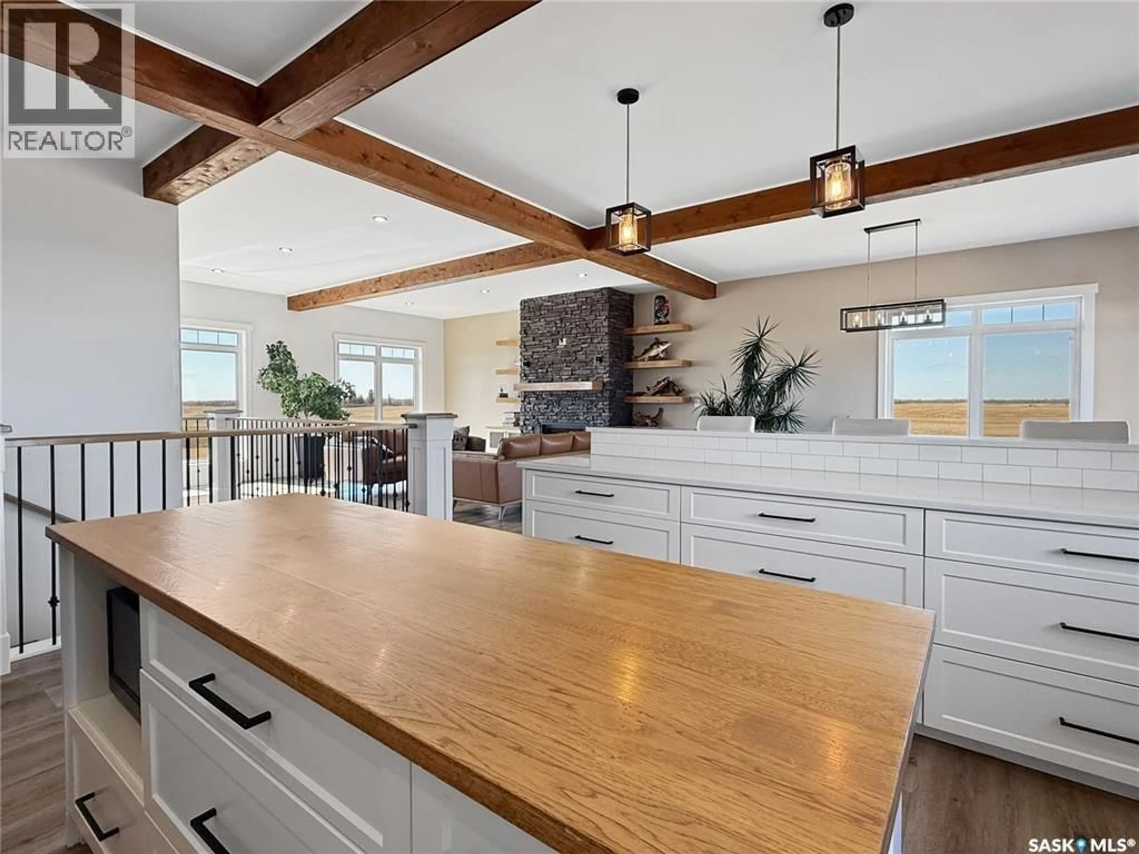 Open concept kitchen, wood/laminate floor for REID ROAD, Prince Albert Rm No. 461 Saskatchewan S6V5S4