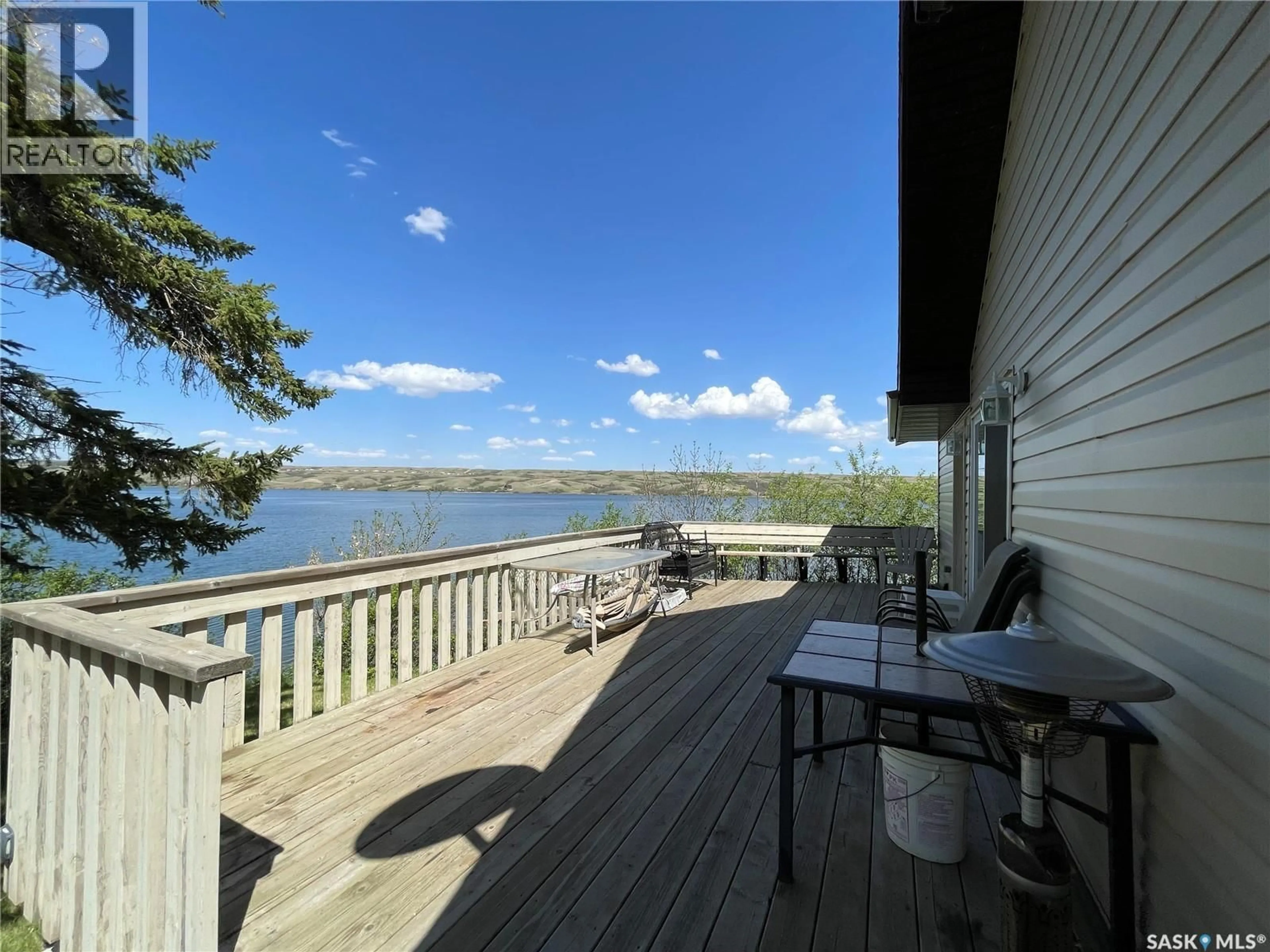 Patio, water/lake/river/ocean view for 1220 TATANKA DRIVE, Sun Valley Saskatchewan S0G1P0