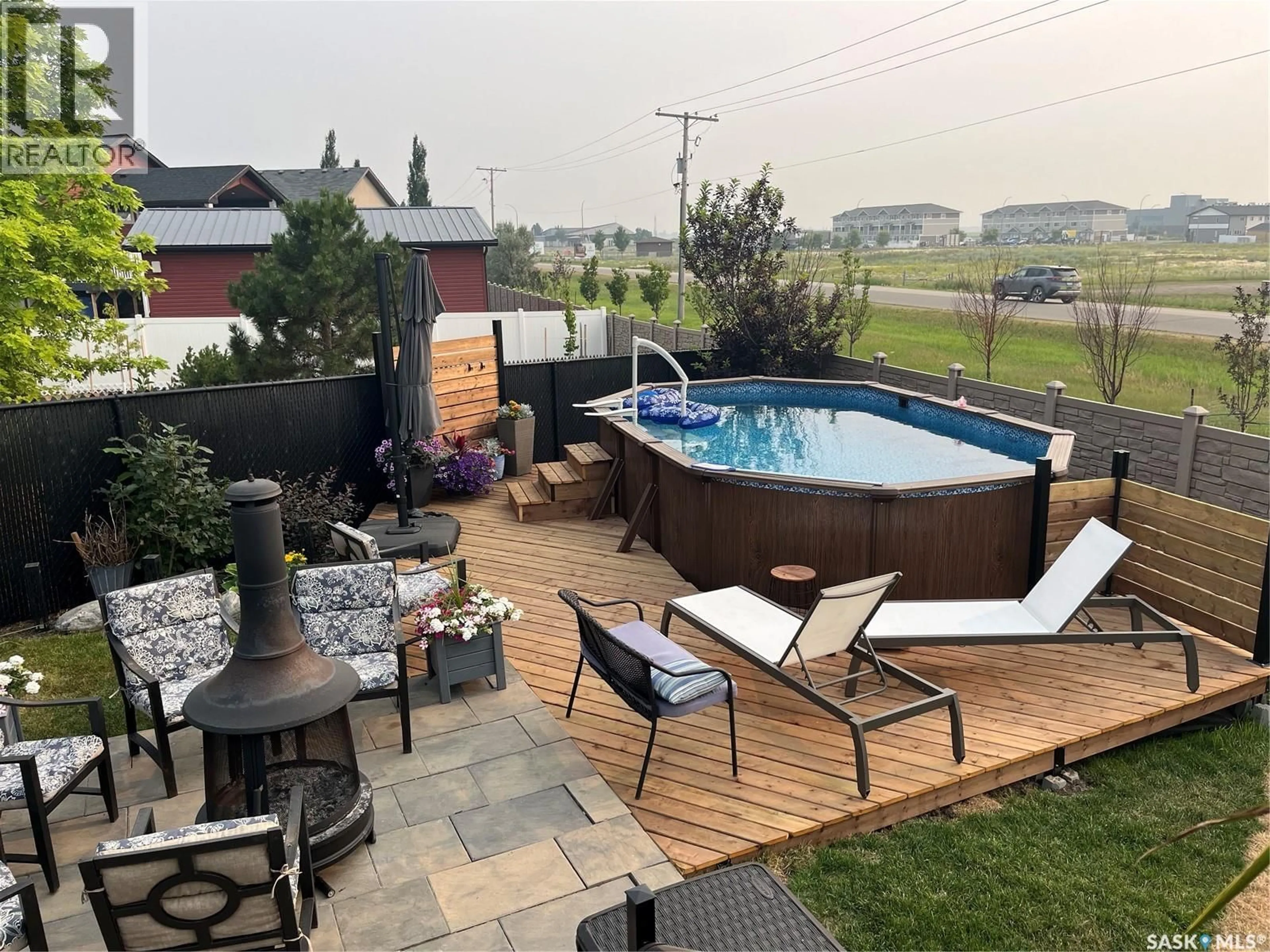 Patio, water/lake/river/ocean view for 1528 MAPLE HILL CRESCENT, Regina Saskatchewan S4X0E8