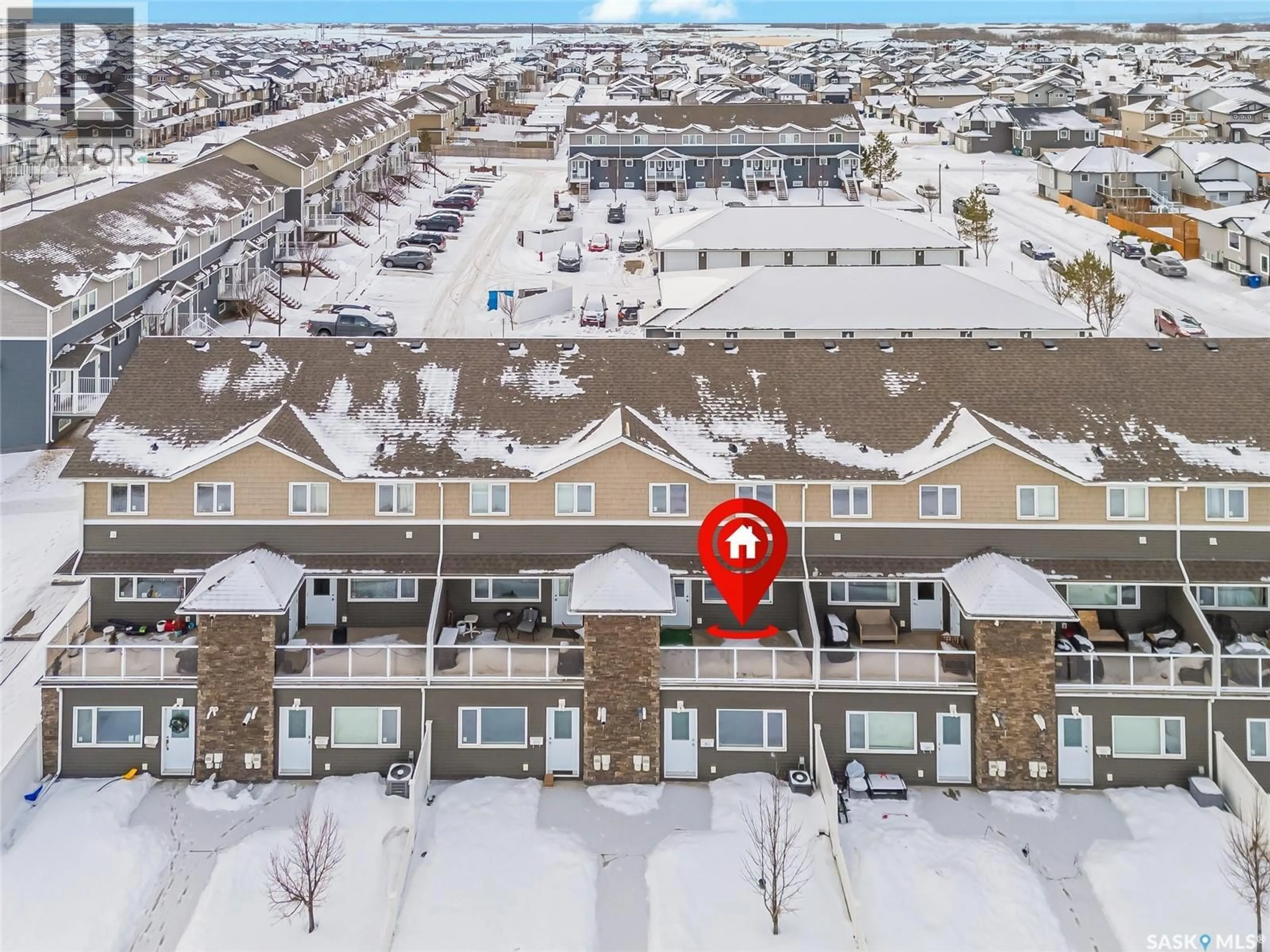 A pic from outside/outdoor area/front of a property/back of a property/a pic from drone, unknown for 210 - 275 PRINGLE LANE, Saskatoon Saskatchewan S7T0T5