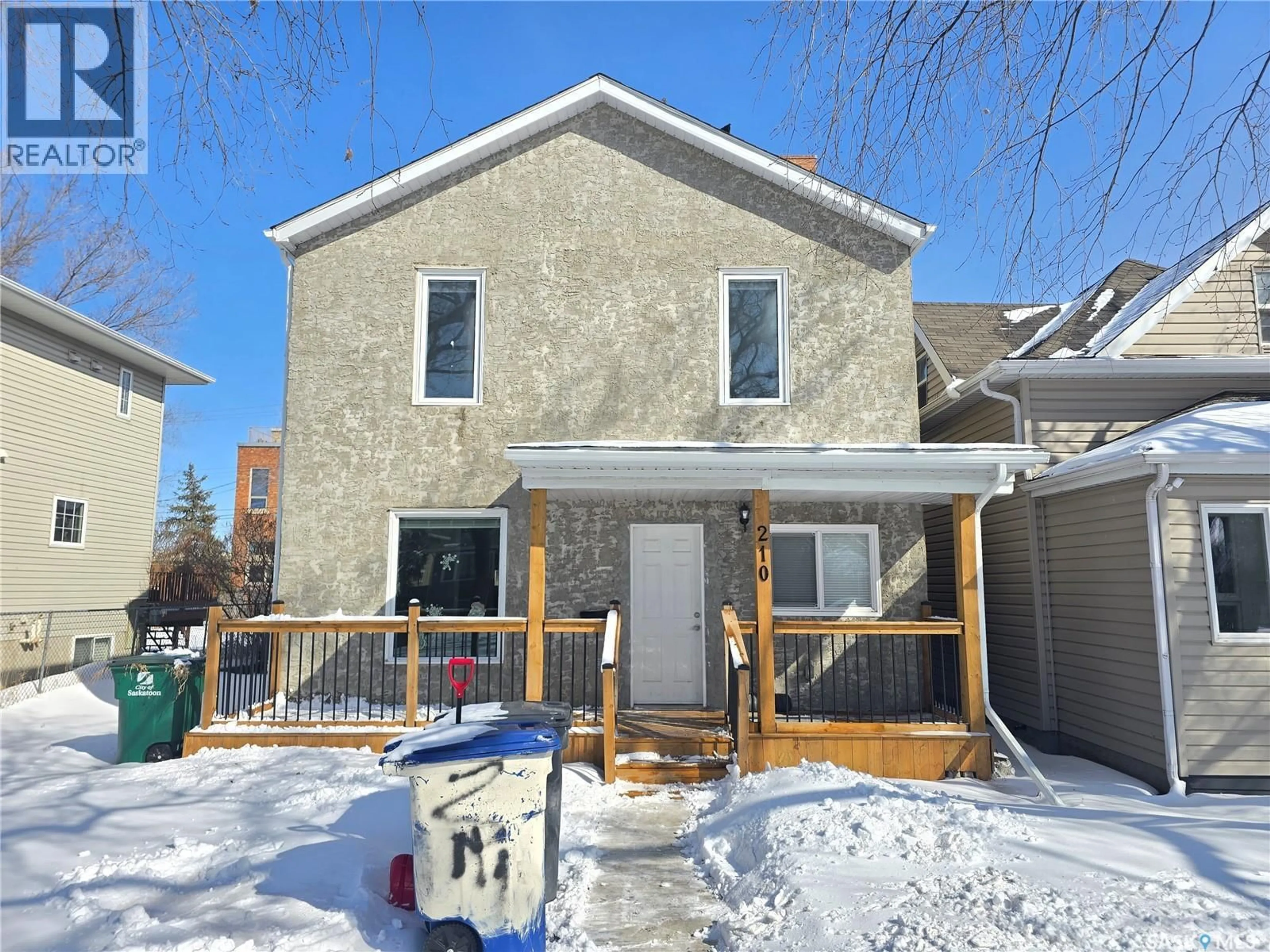 Home with brick exterior material, street for 210 E AVENUE N, Saskatoon Saskatchewan S7L1R7