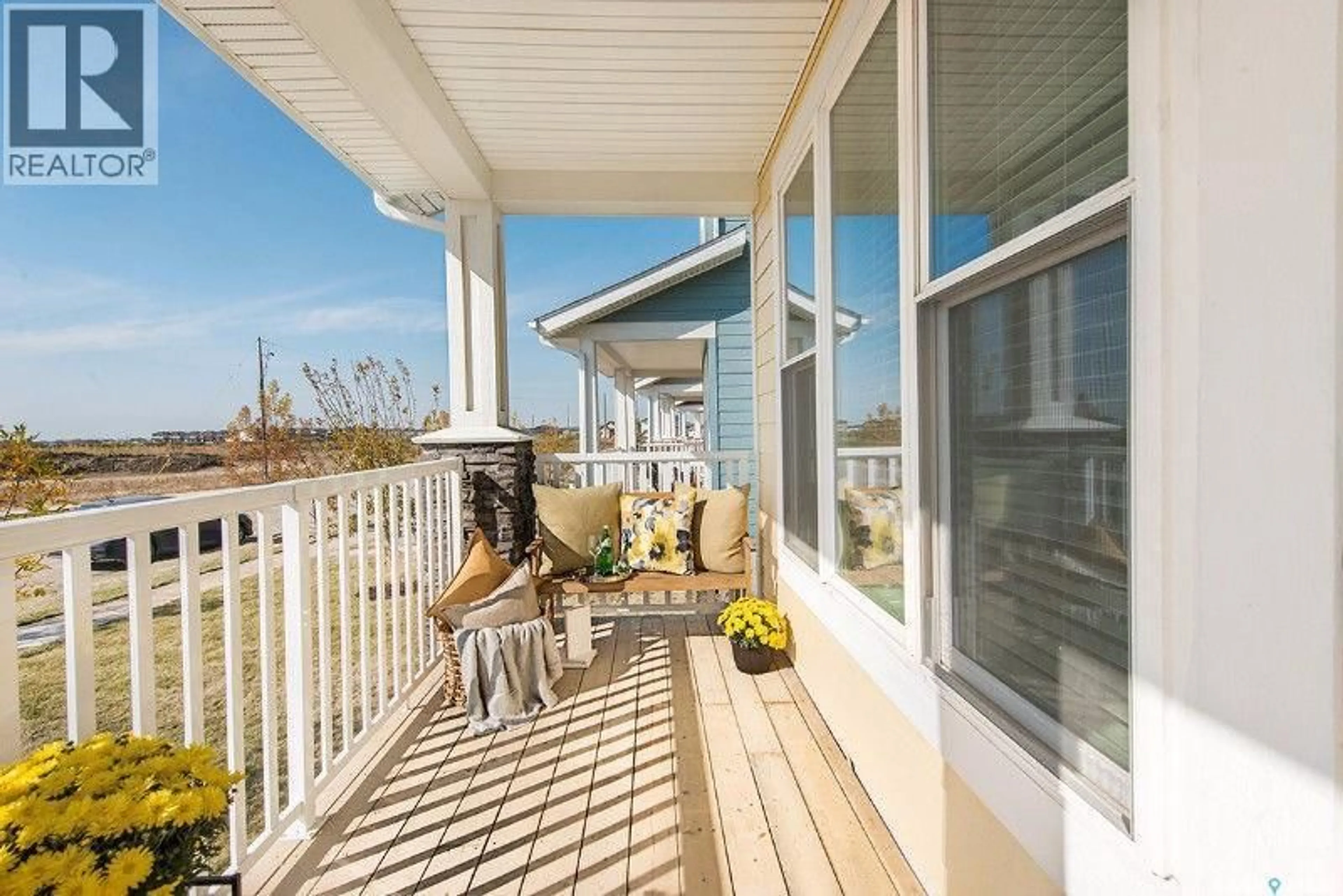 Patio, water/lake/river/ocean view for 447 EATON LANE, Saskatoon Saskatchewan S7V0H5