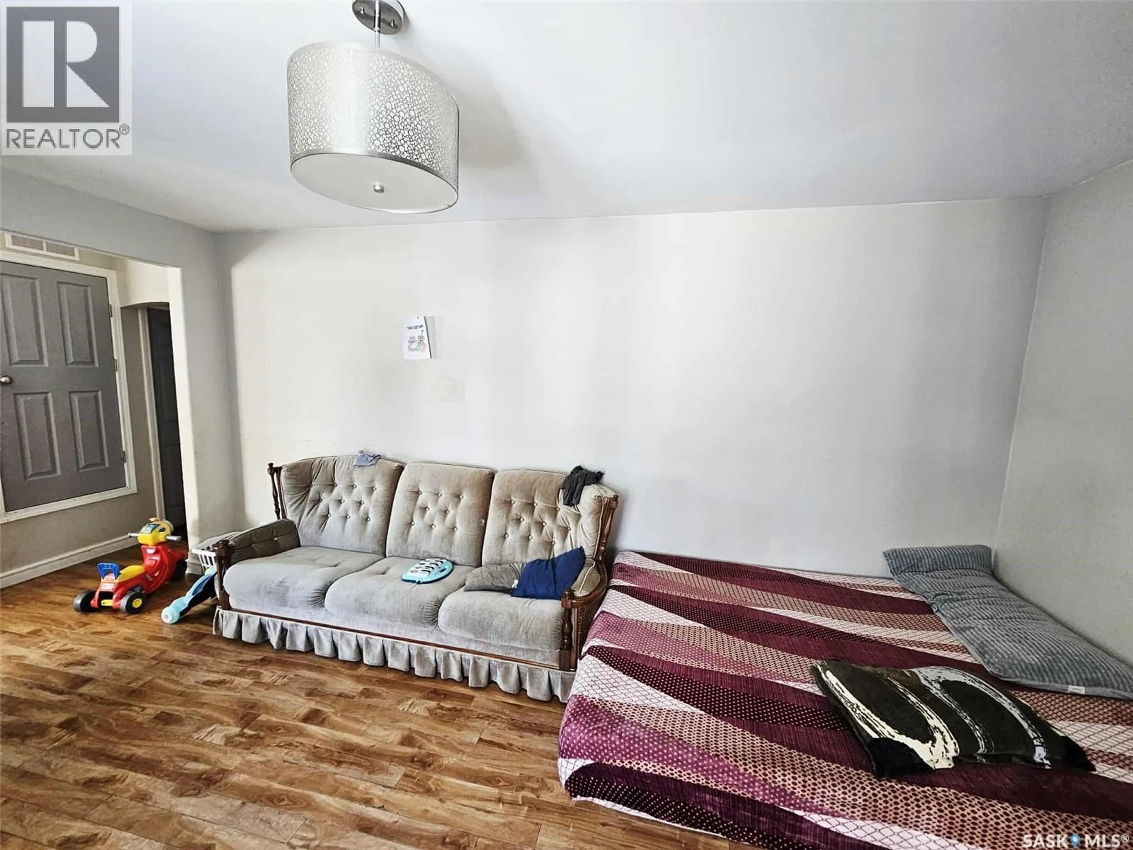 Living room with furniture, unknown for 201 BROADWAY STREET, Yorkton Saskatchewan S3N0M8