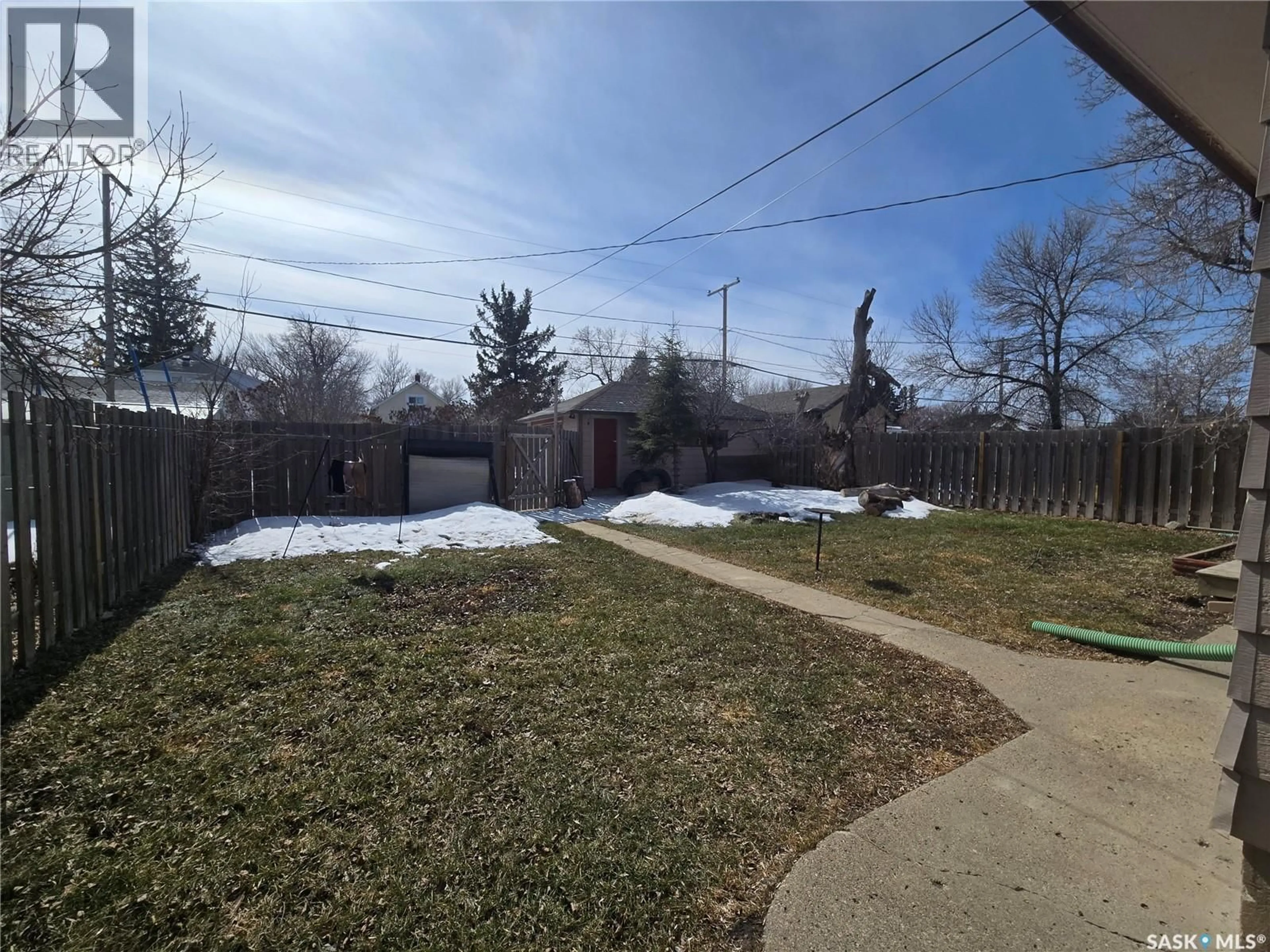 A pic from outside/outdoor area/front of a property/back of a property/a pic from drone, mountain view for 703 MAIN STREET, Kipling Saskatchewan S0G2S0