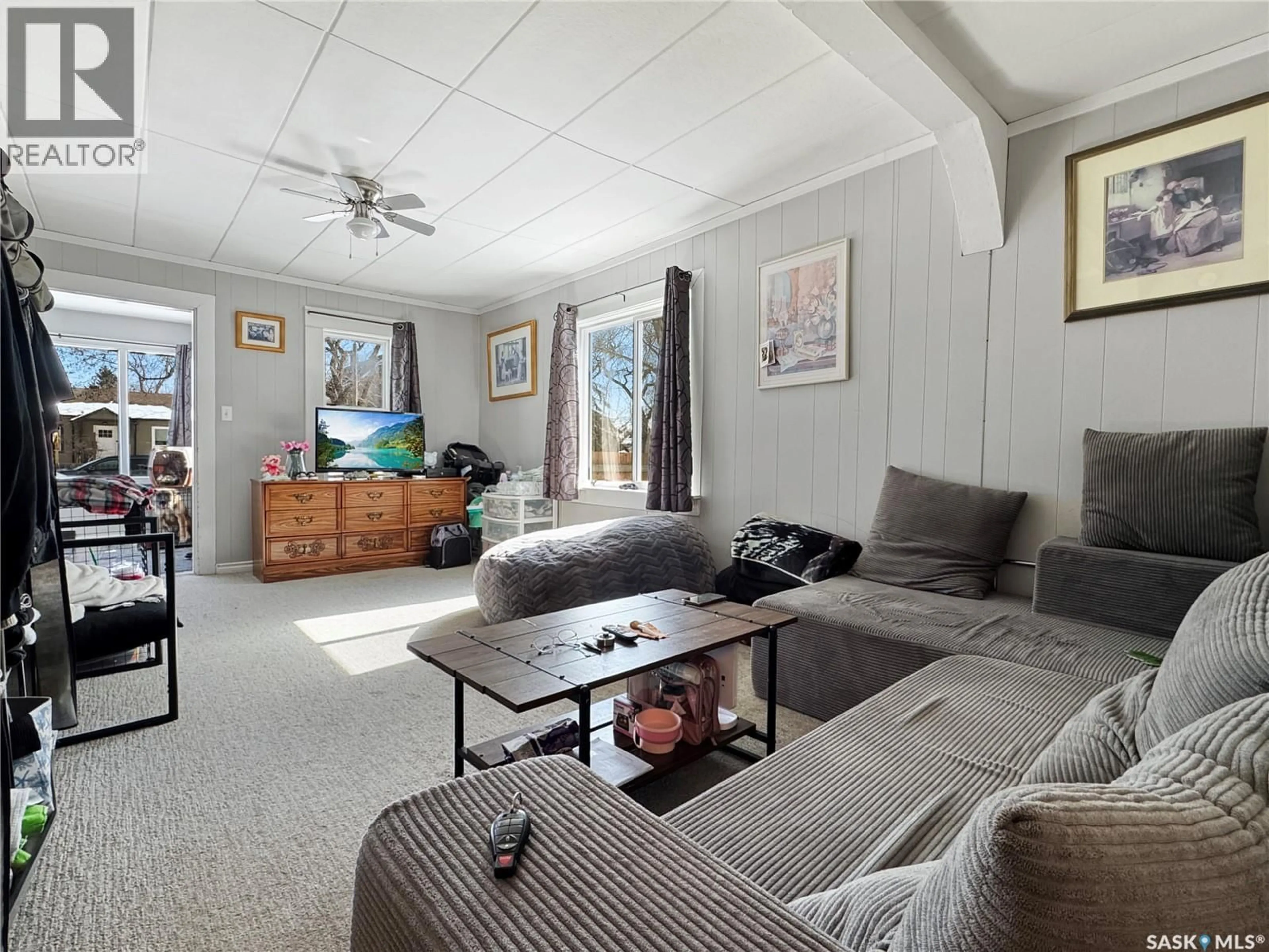 Living room with furniture, unknown for 1441 103RD STREET, North Battleford Saskatchewan S9A1L2