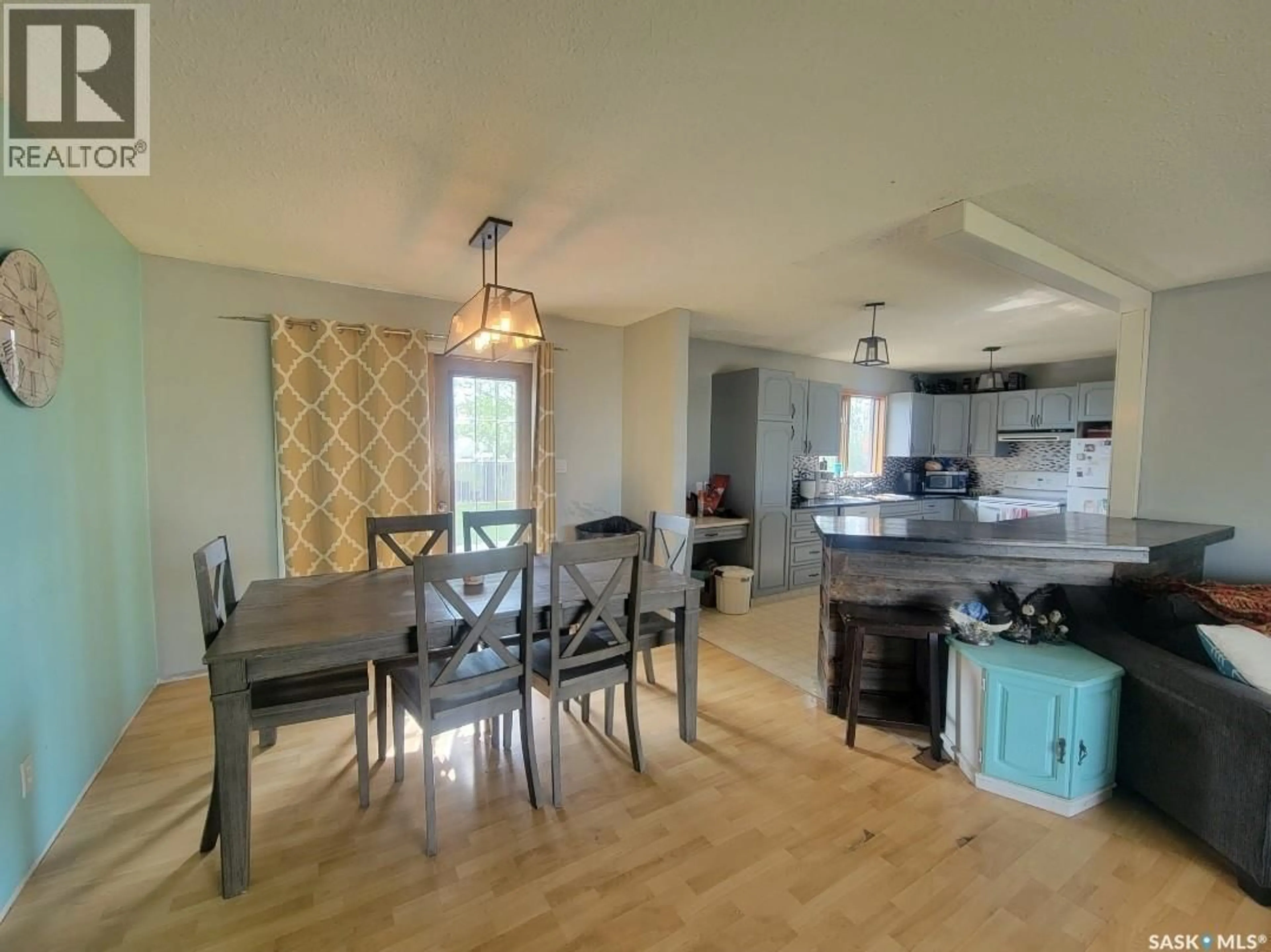 Open concept kitchen, wood/laminate floor for 5034 MIRROR DRIVE, Macklin Saskatchewan S0L2S0