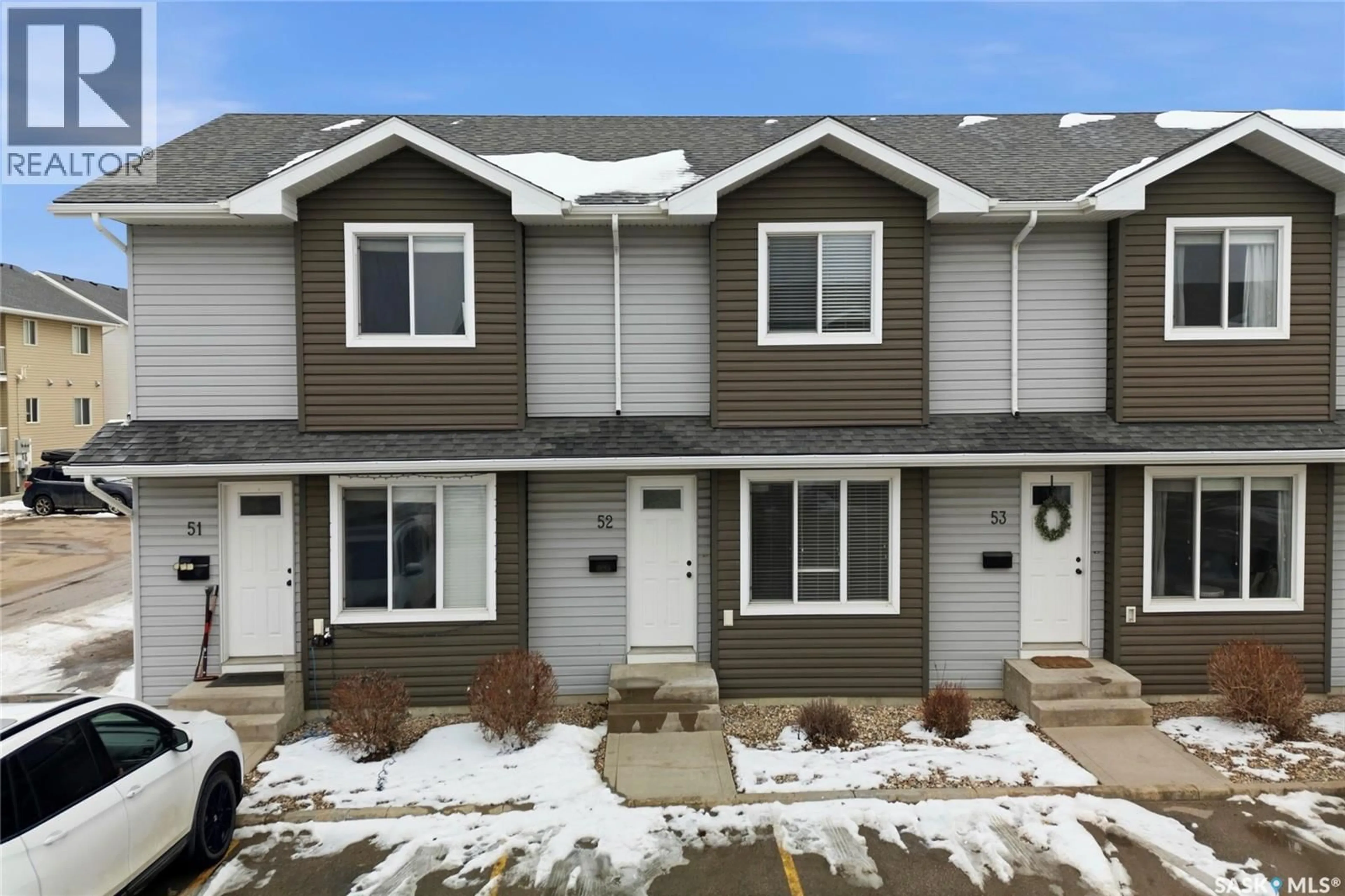 Home with vinyl exterior material, street for 52 - 4850 HARBOUR LANDING DRIVE, Regina Saskatchewan S4W0K9