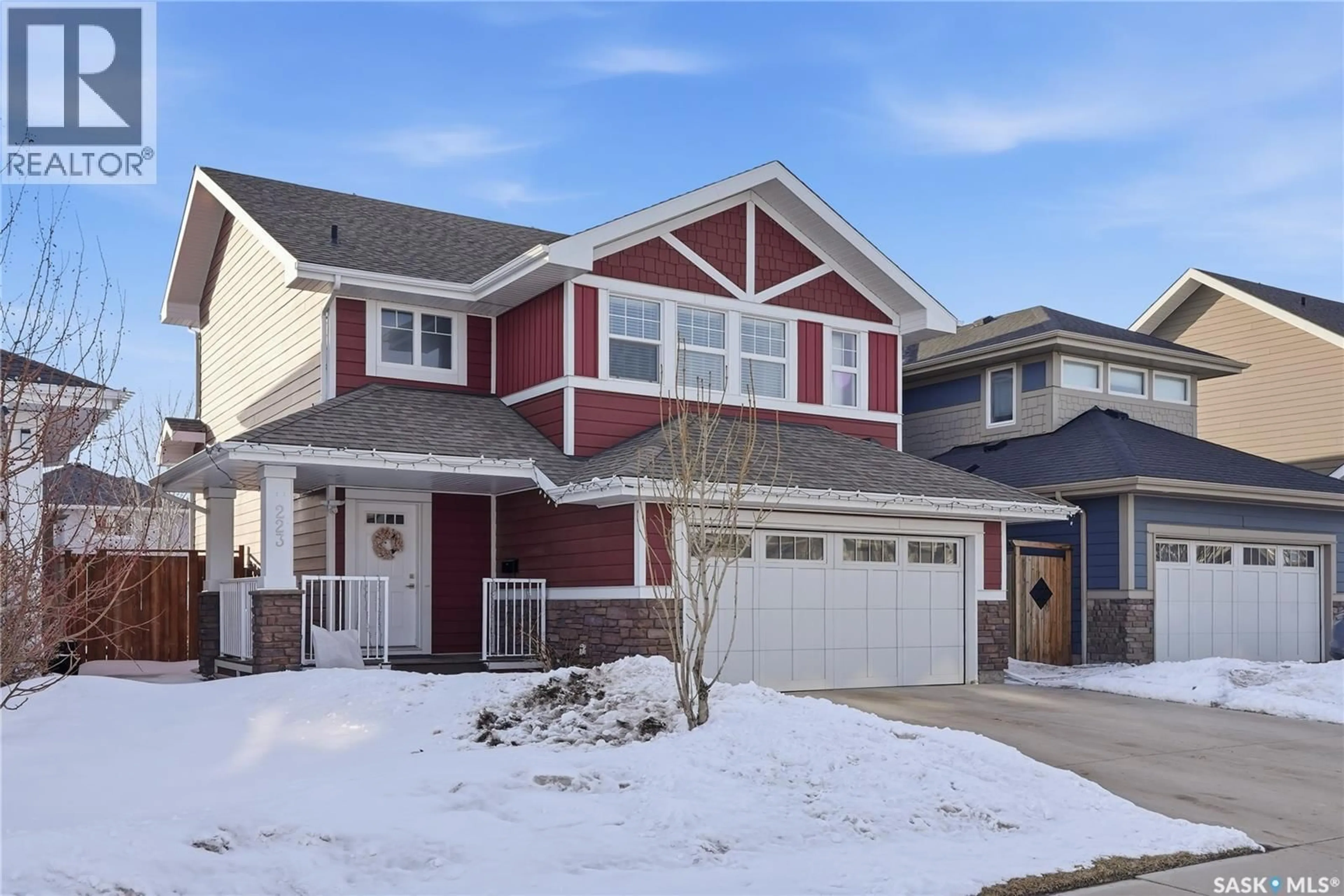 Home with vinyl exterior material, street for 223 EATON CRESCENT, Saskatoon Saskatchewan S7V0H4