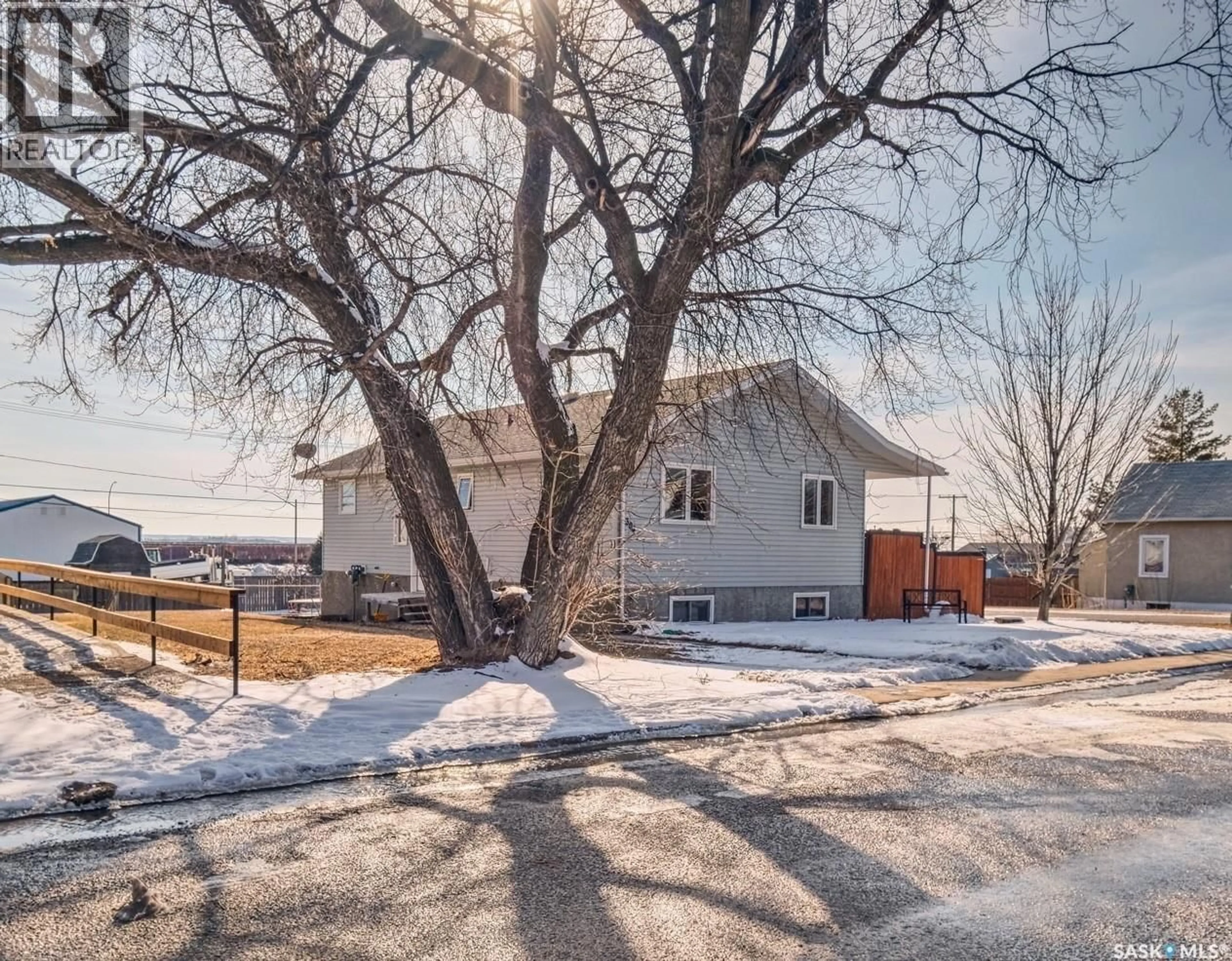 A pic from outside/outdoor area/front of a property/back of a property/a pic from drone, street for 304 2ND AVE, Biggar Saskatchewan S0K0M0