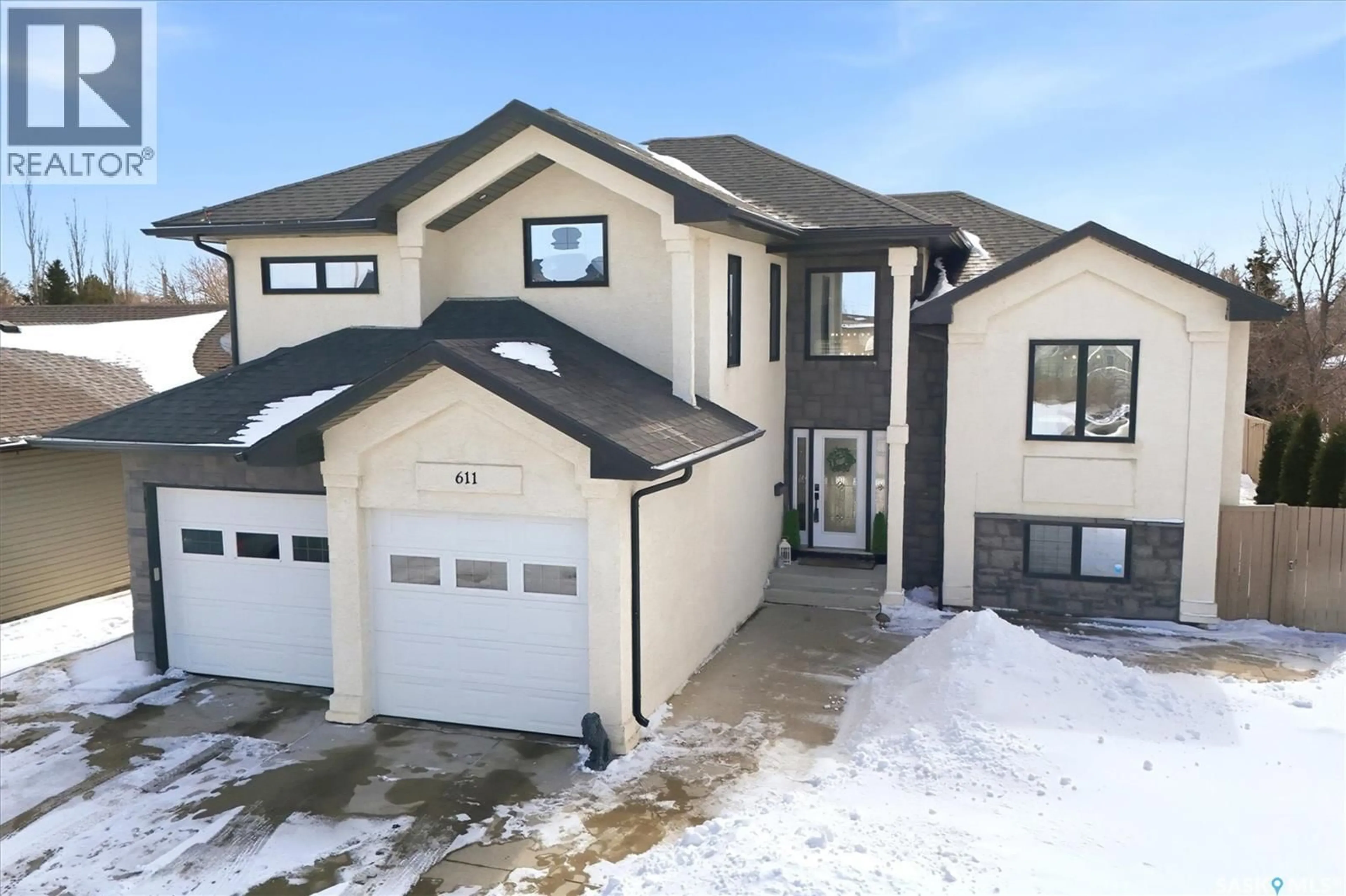 A pic from outside/outdoor area/front of a property/back of a property/a pic from drone, street for 611 CEDAR AVENUE, Dalmeny Saskatchewan S0K1E0