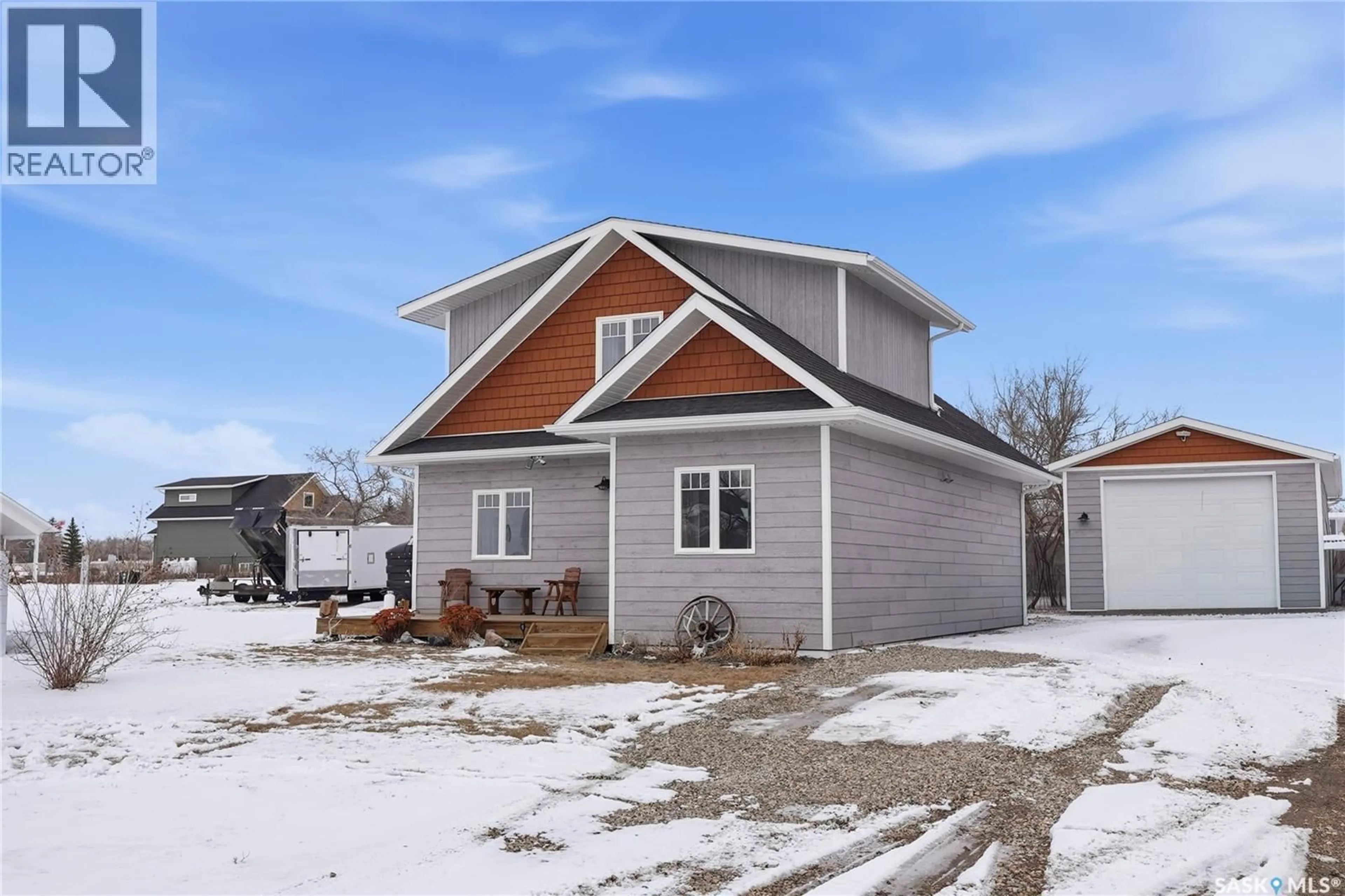 Home with vinyl exterior material, street for 34 GRACE LANE, Diefenbaker Lake Saskatchewan S0L2E0