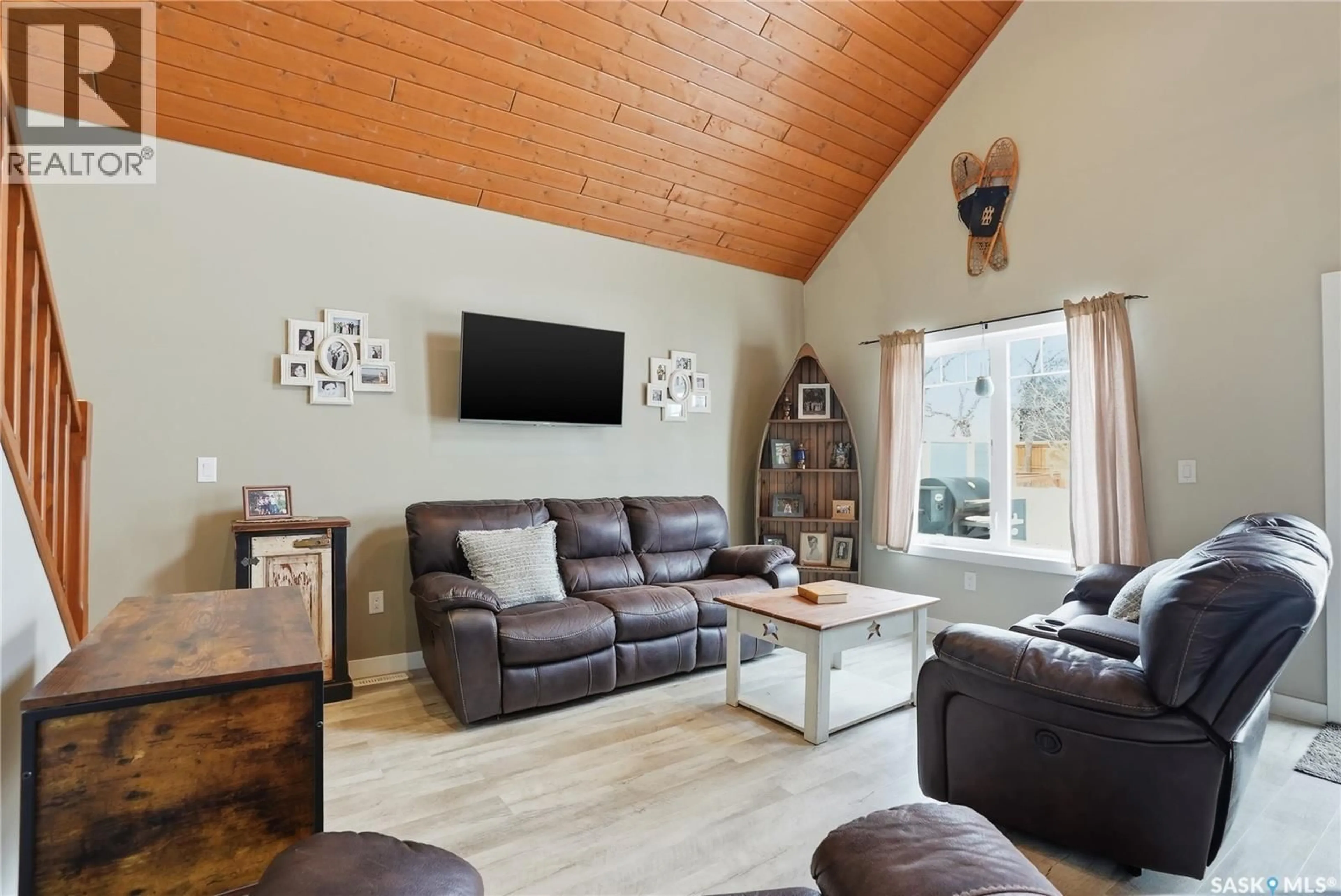 Living room with furniture, wood/laminate floor for 34 GRACE LANE, Diefenbaker Lake Saskatchewan S0L2E0