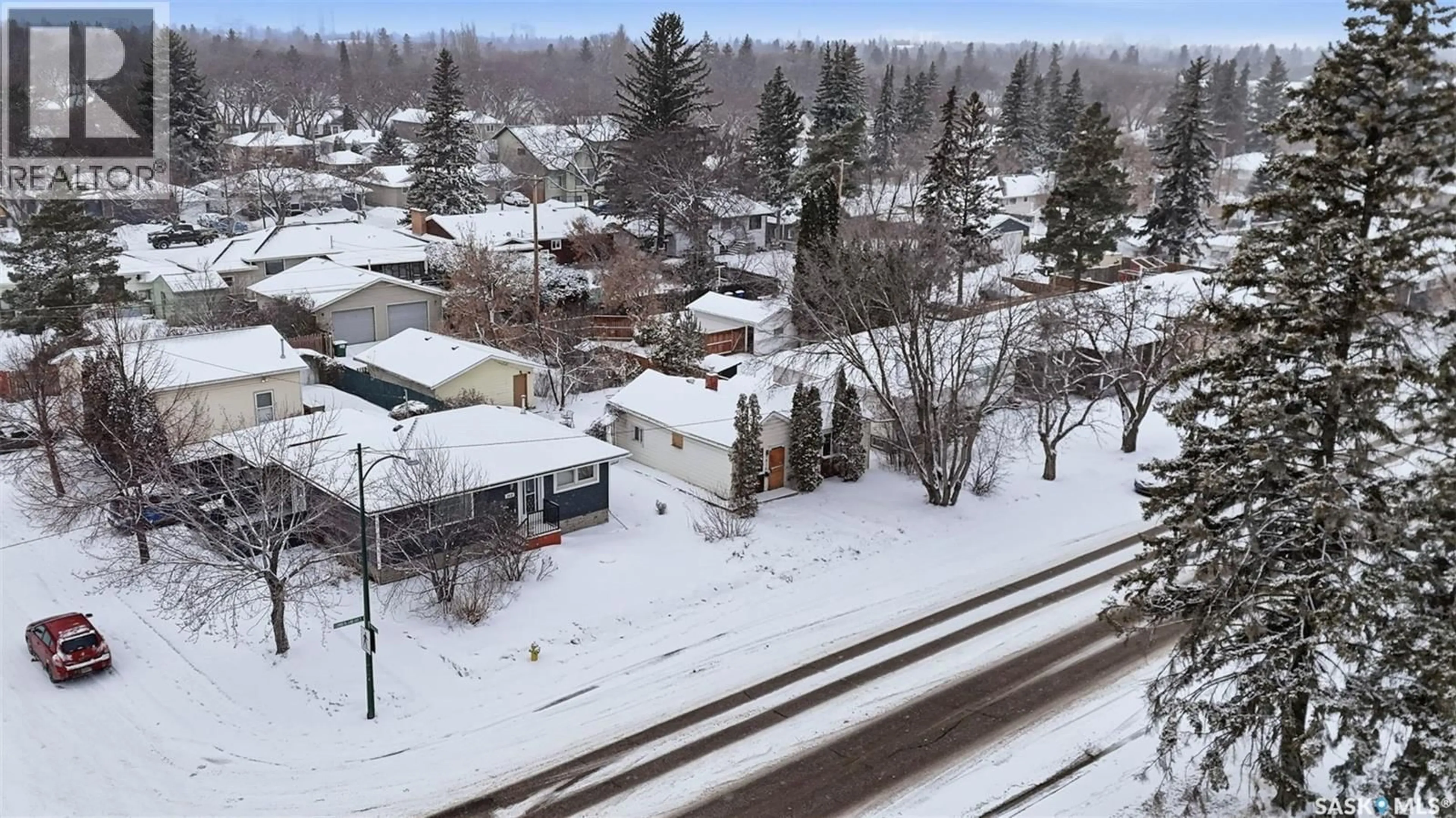 A pic from outside/outdoor area/front of a property/back of a property/a pic from drone, street for 1414 CUMBERLAND AVENUE, Saskatoon Saskatchewan S7H2M1
