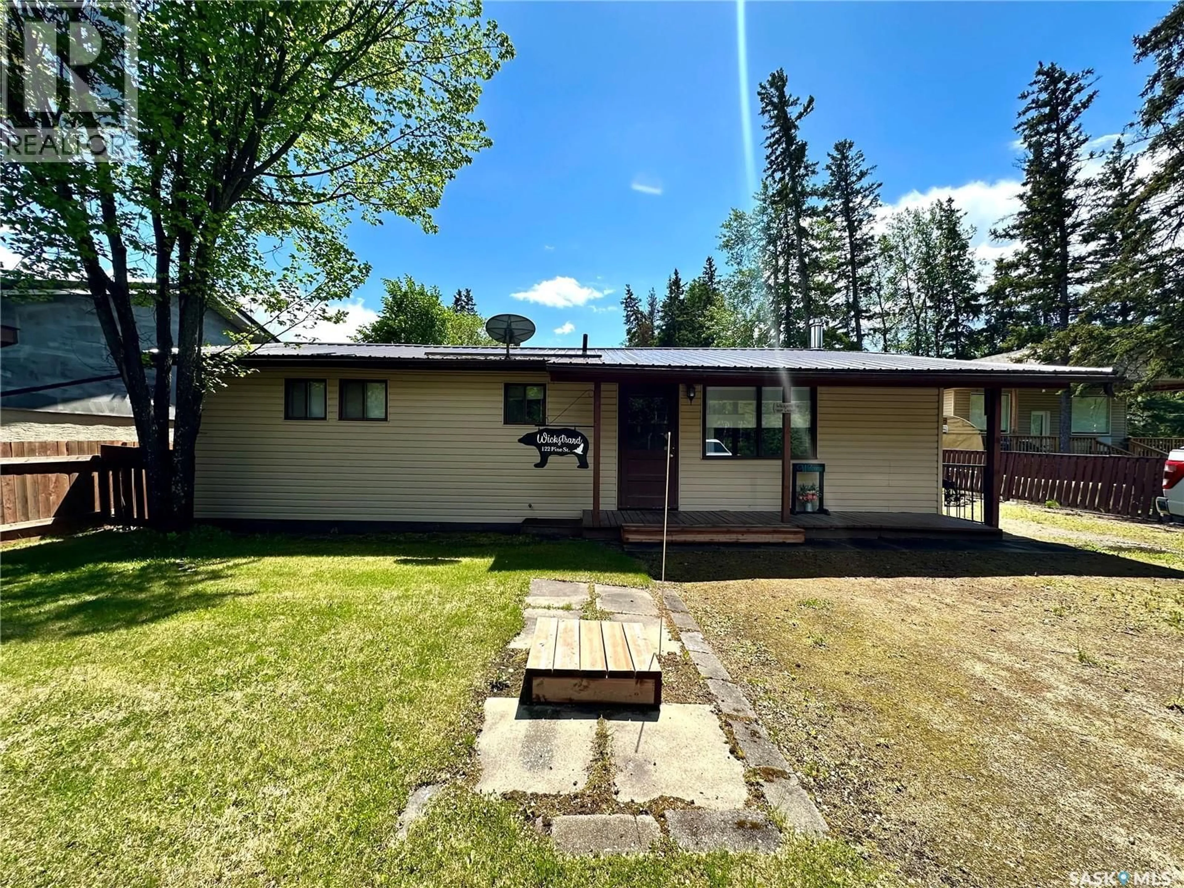 A pic from outside/outdoor area/front of a property/back of a property/a pic from drone, building for 122 PINE STREET, Chitek Lake Saskatchewan S0J0L0