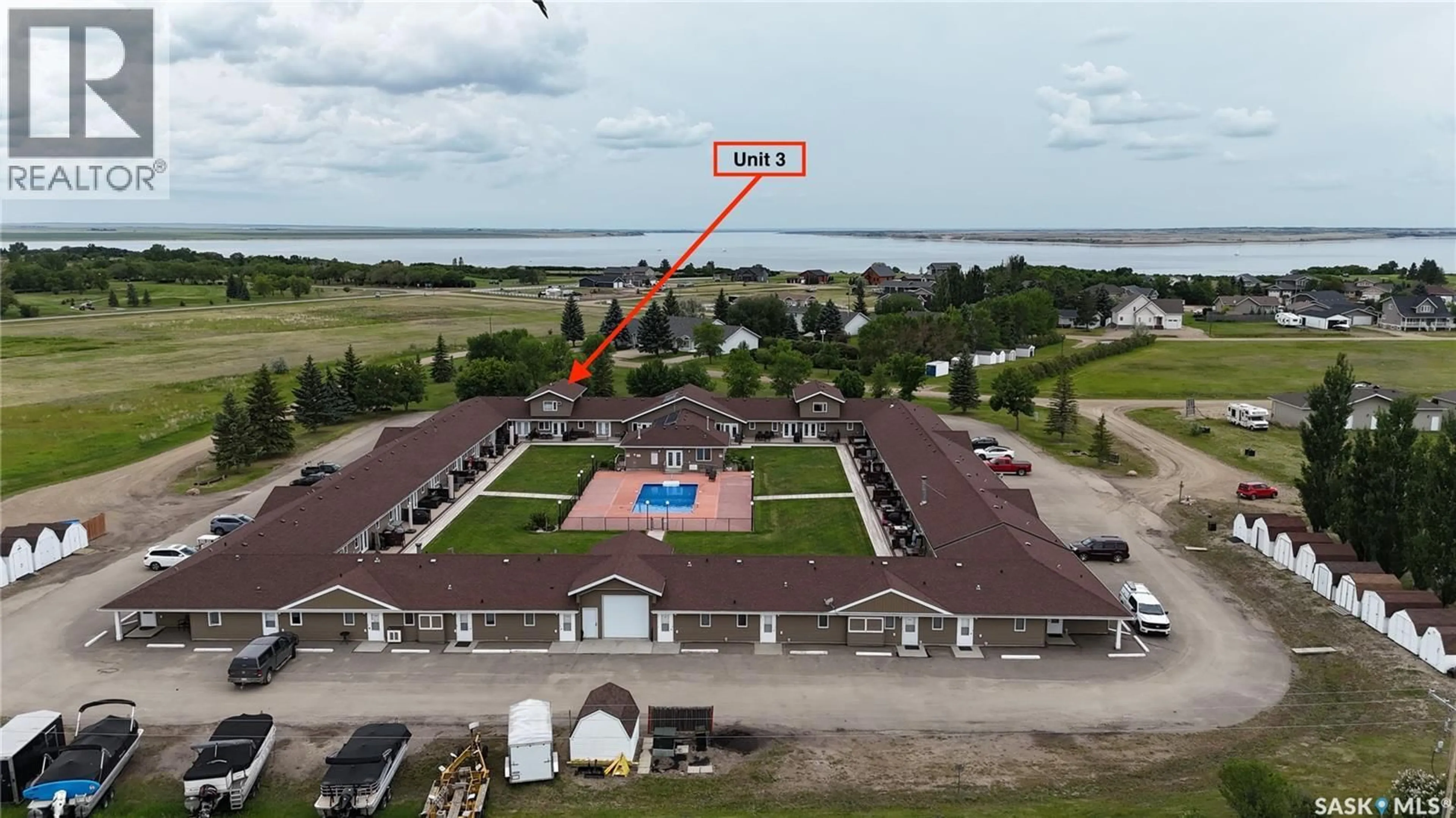 A pic from outside/outdoor area/front of a property/back of a property/a pic from drone, water/lake/river/ocean view for 3 1250 AARO AVENUE, Elbow Saskatchewan S0H1J0
