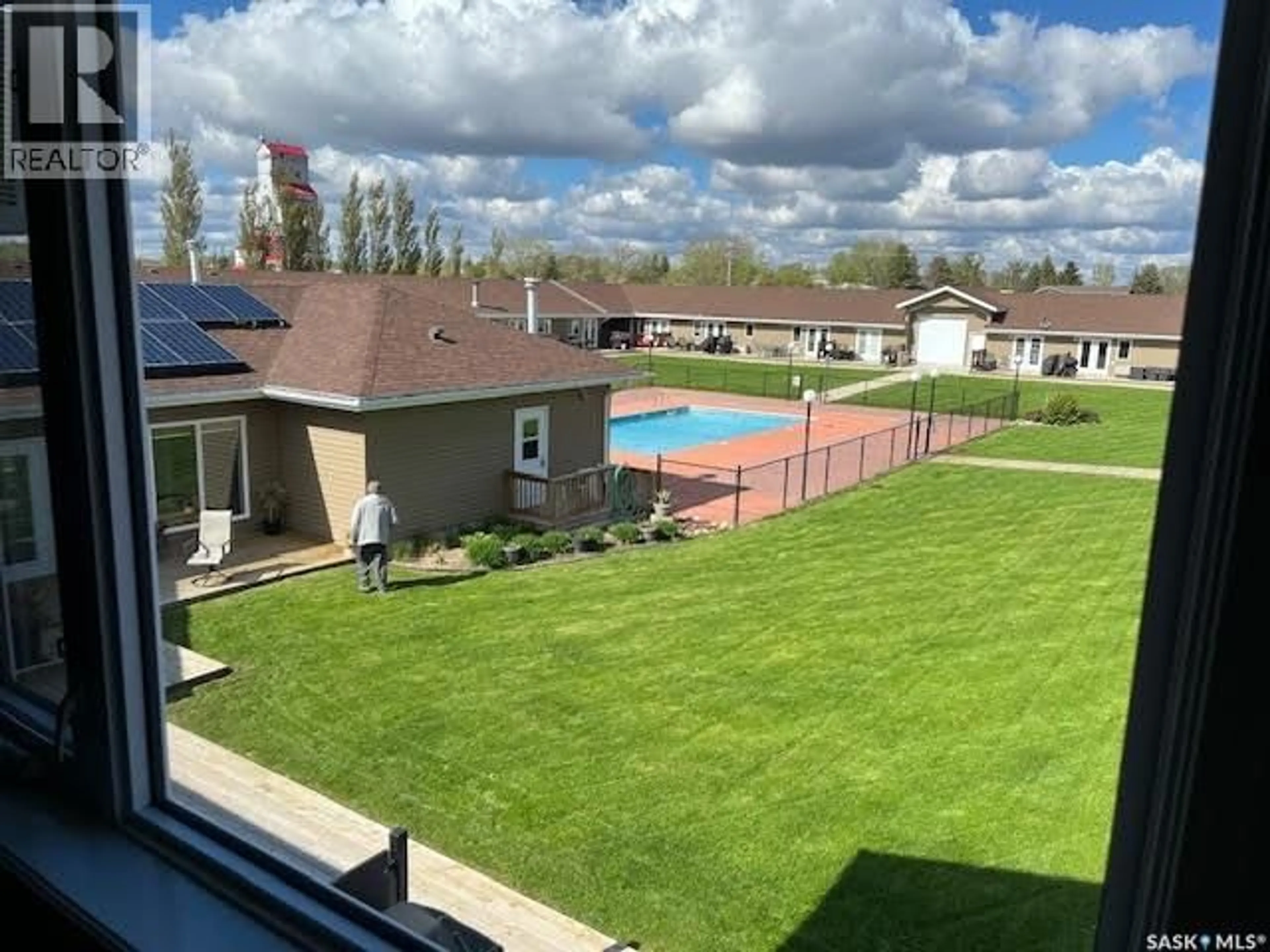 A pic from outside/outdoor area/front of a property/back of a property/a pic from drone, water/lake/river/ocean view for 3 1250 AARO AVENUE, Elbow Saskatchewan S0H1J0