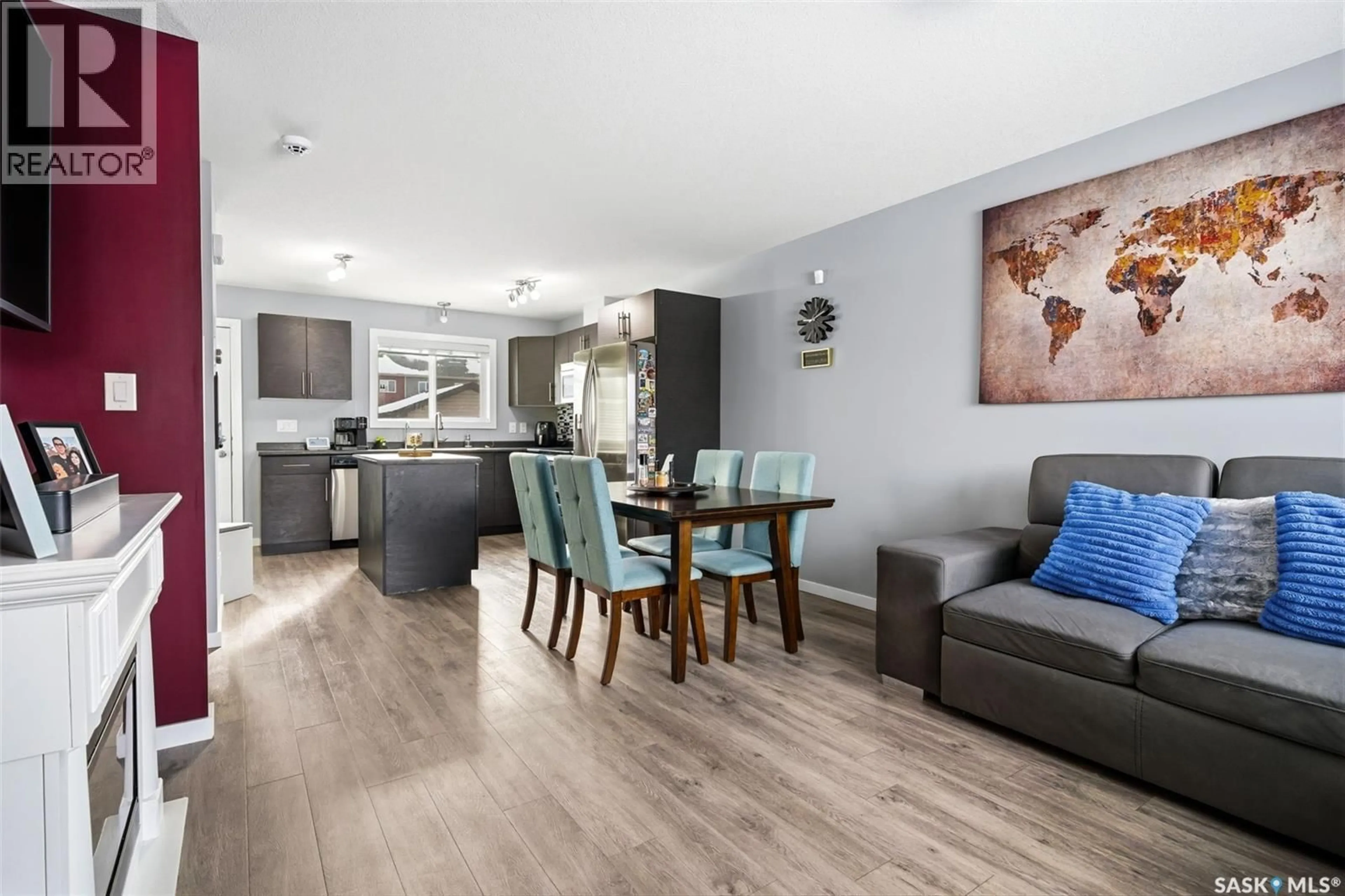 Open concept kitchen, wood/laminate floor for 3457 GREEN LAVENDER DRIVE, Regina Saskatchewan S4V3M6