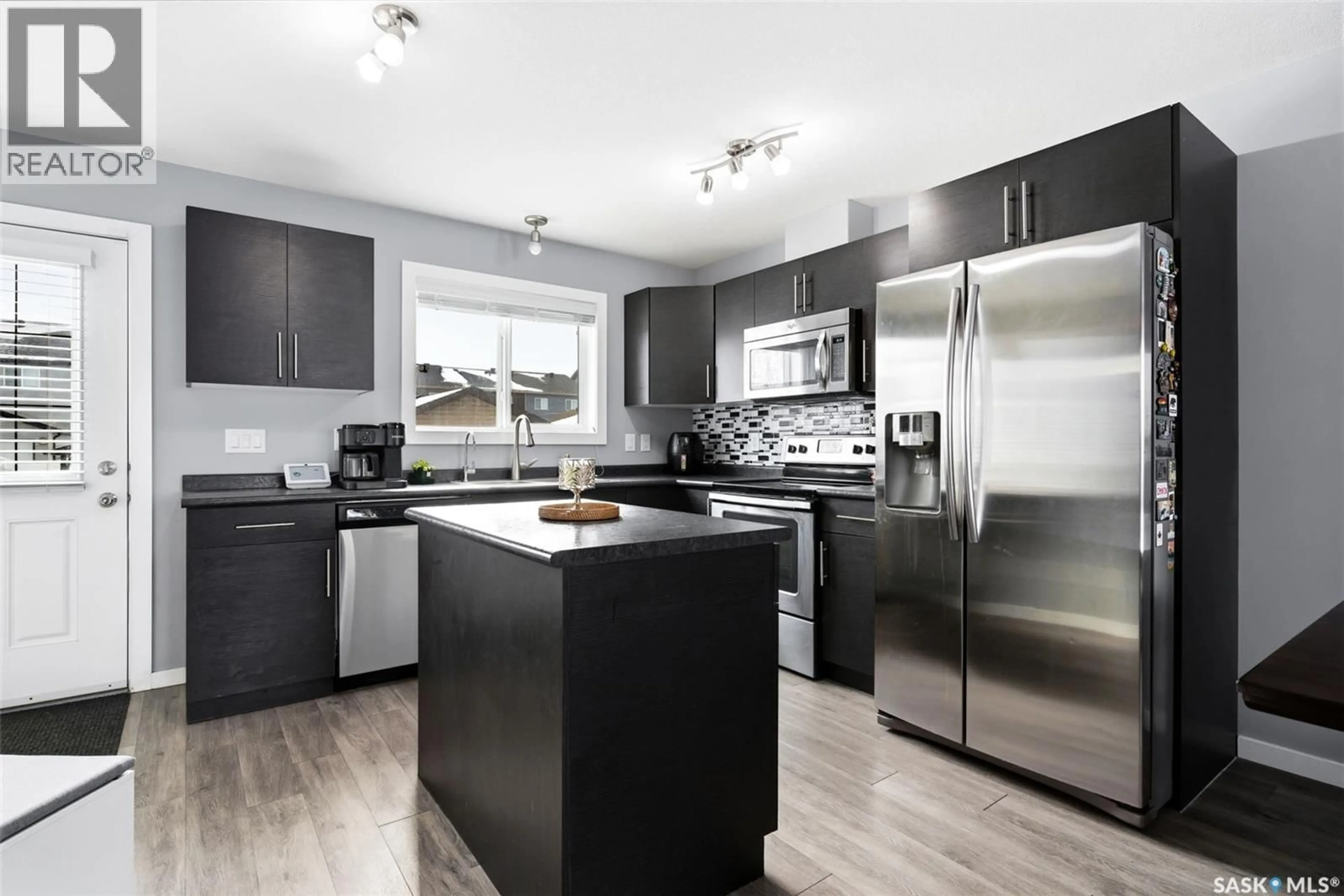 Open concept kitchen, unknown for 3457 GREEN LAVENDER DRIVE, Regina Saskatchewan S4V3M6