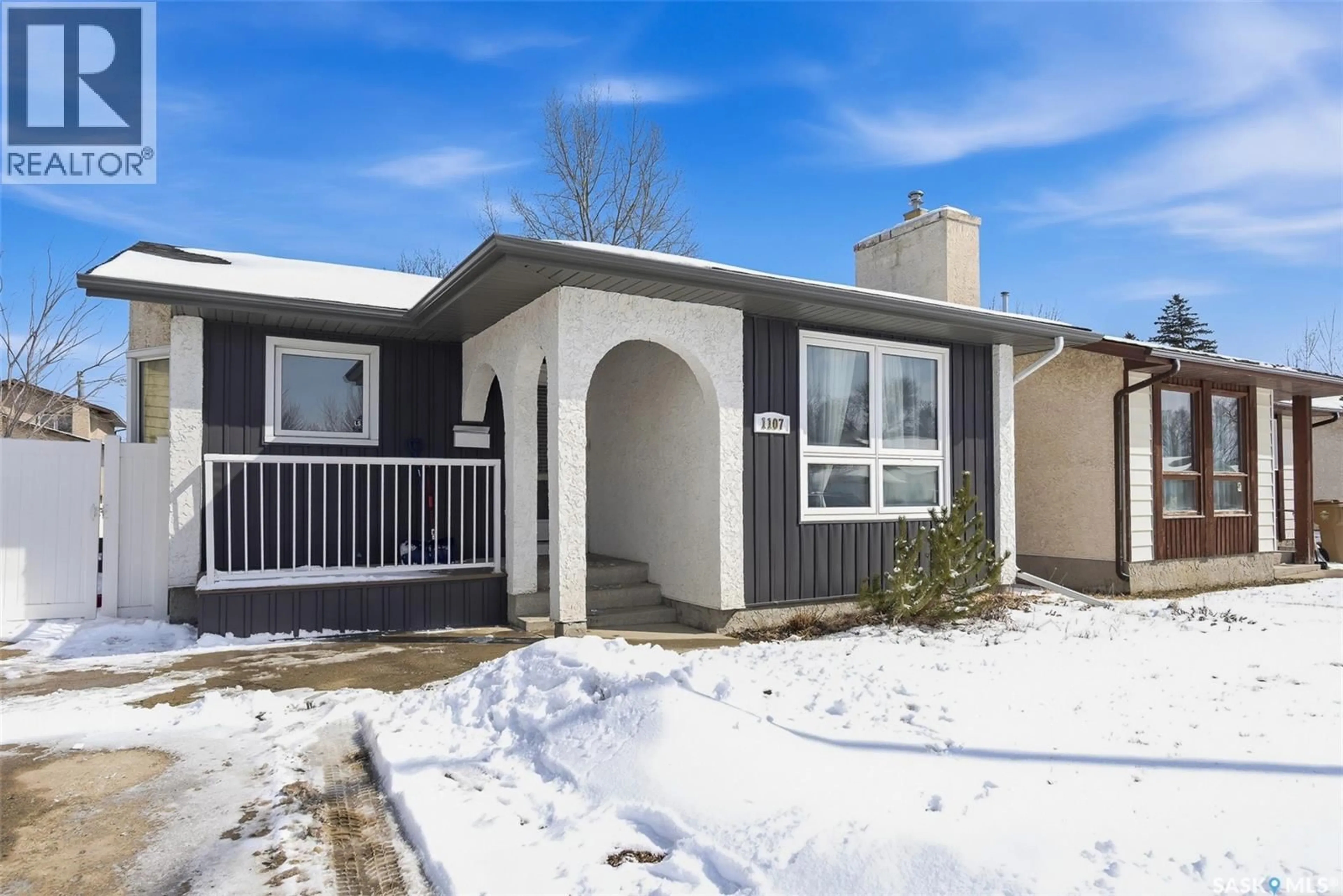Home with vinyl exterior material, street for 1107 GRAHAM ROAD, Regina Saskatchewan S4N5Z7