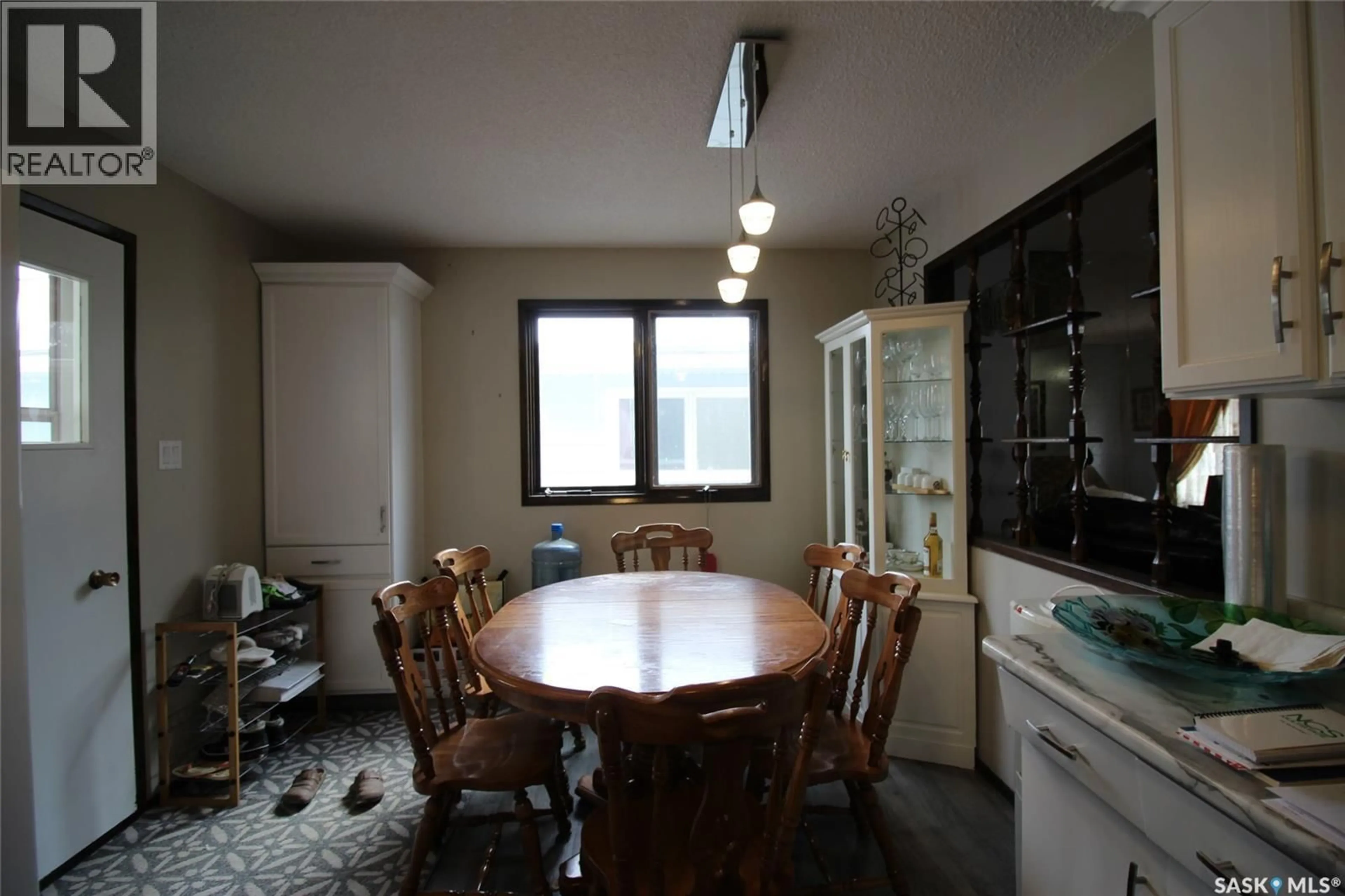 Dining room, wood/laminate floor for 522 4TH STREET, Shaunavon Saskatchewan S0N2M0
