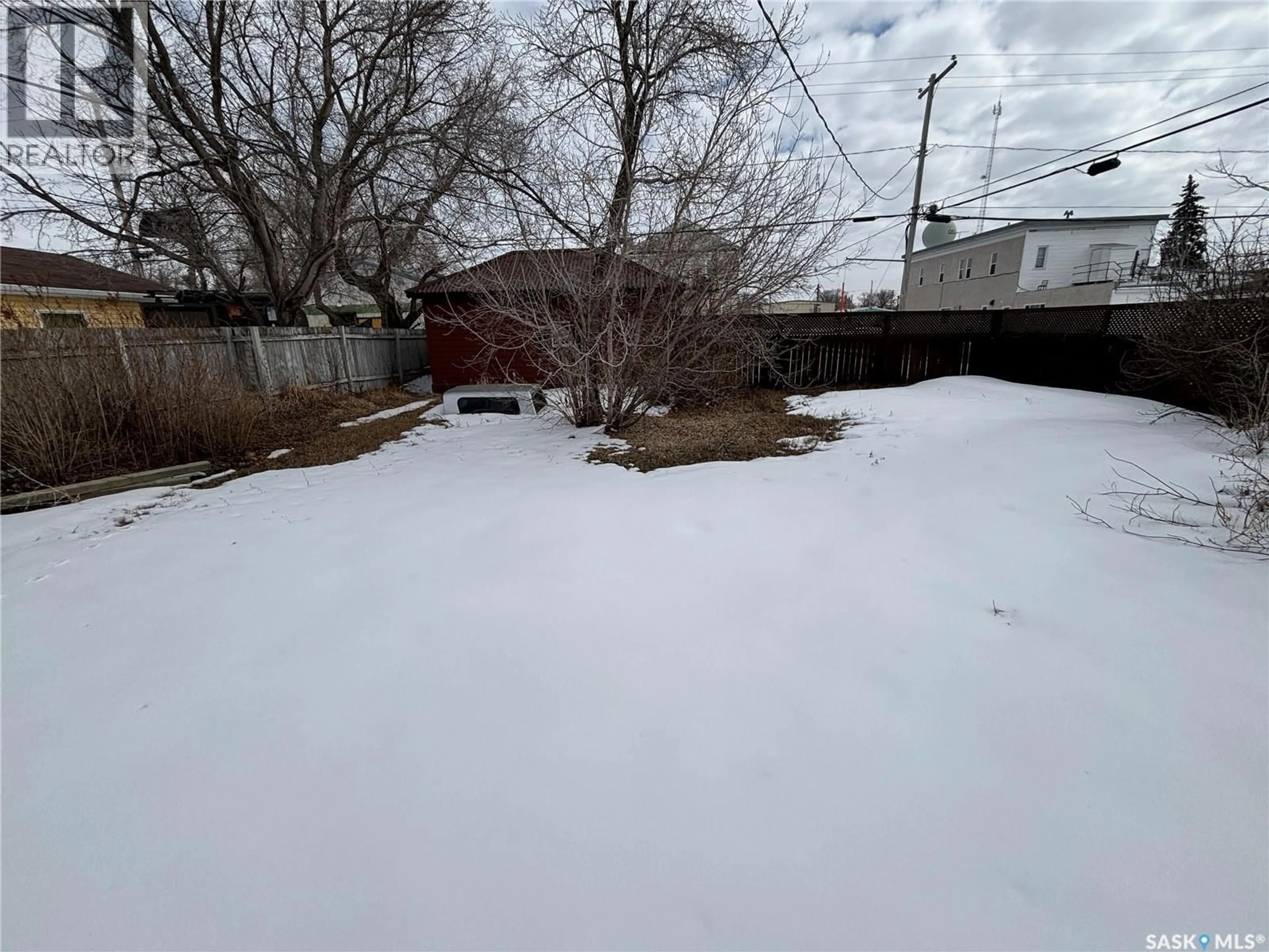 A pic from outside/outdoor area/front of a property/back of a property/a pic from drone, street for 301 2ND STREET, Delisle Saskatchewan S0L0P0