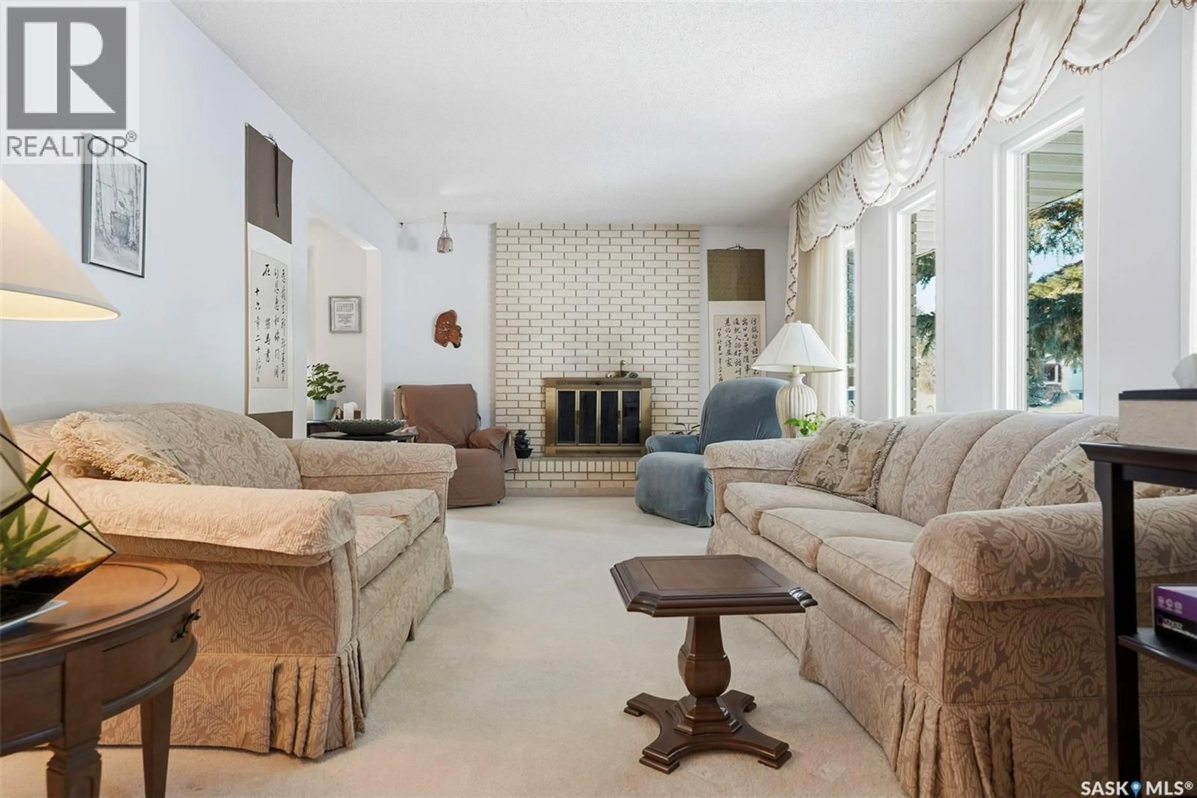 Living room with furniture, ceramic/tile floor for 431 SYLVIAN CRESCENT, Saskatoon Saskatchewan S7H5E8