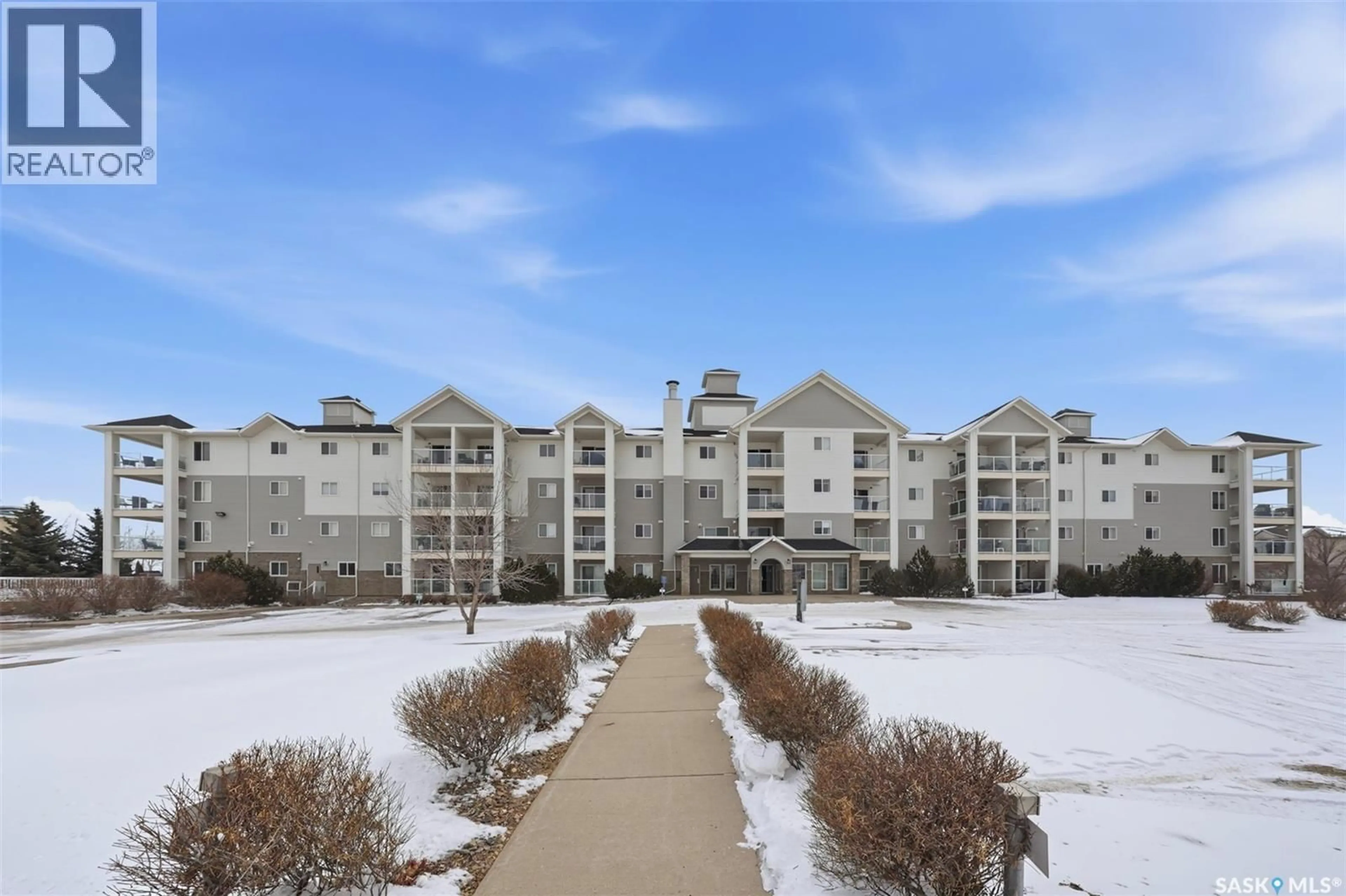 A pic from outside/outdoor area/front of a property/back of a property/a pic from drone, mountain view for 303 - 401 LOWE ROAD, Saskatoon Saskatchewan S7S1P2