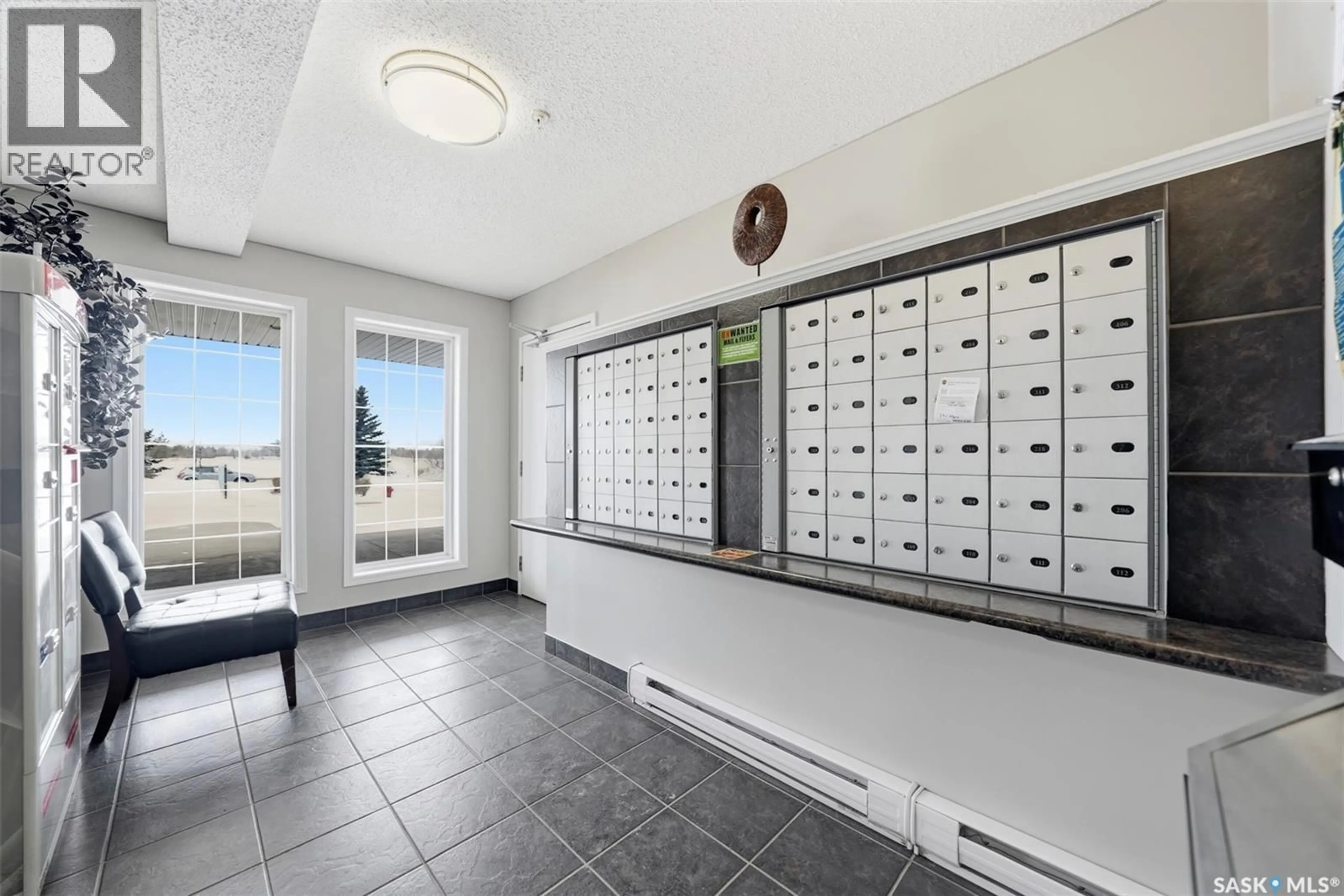 Indoor foyer for 303 - 401 LOWE ROAD, Saskatoon Saskatchewan S7S1P2