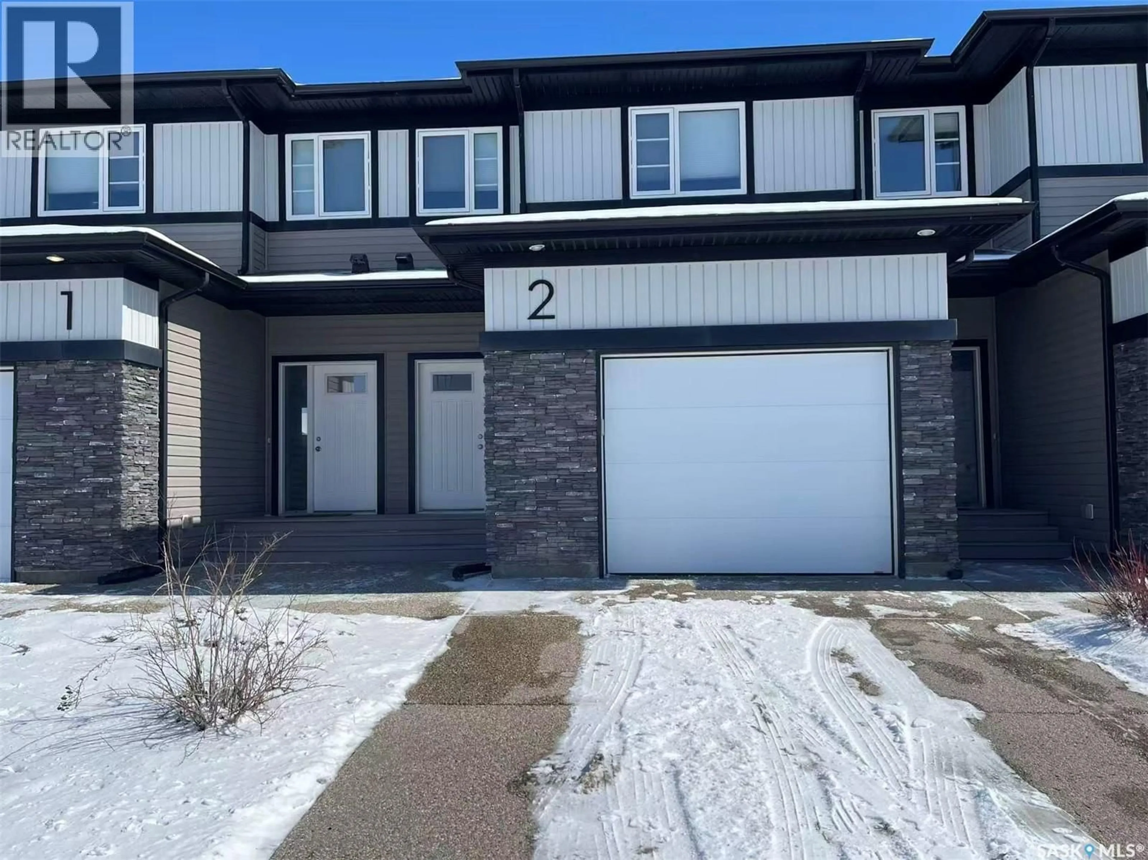 Home with brick exterior material, street for 2 - 5301 BEACON DRIVE, Regina Saskatchewan S4W0R6