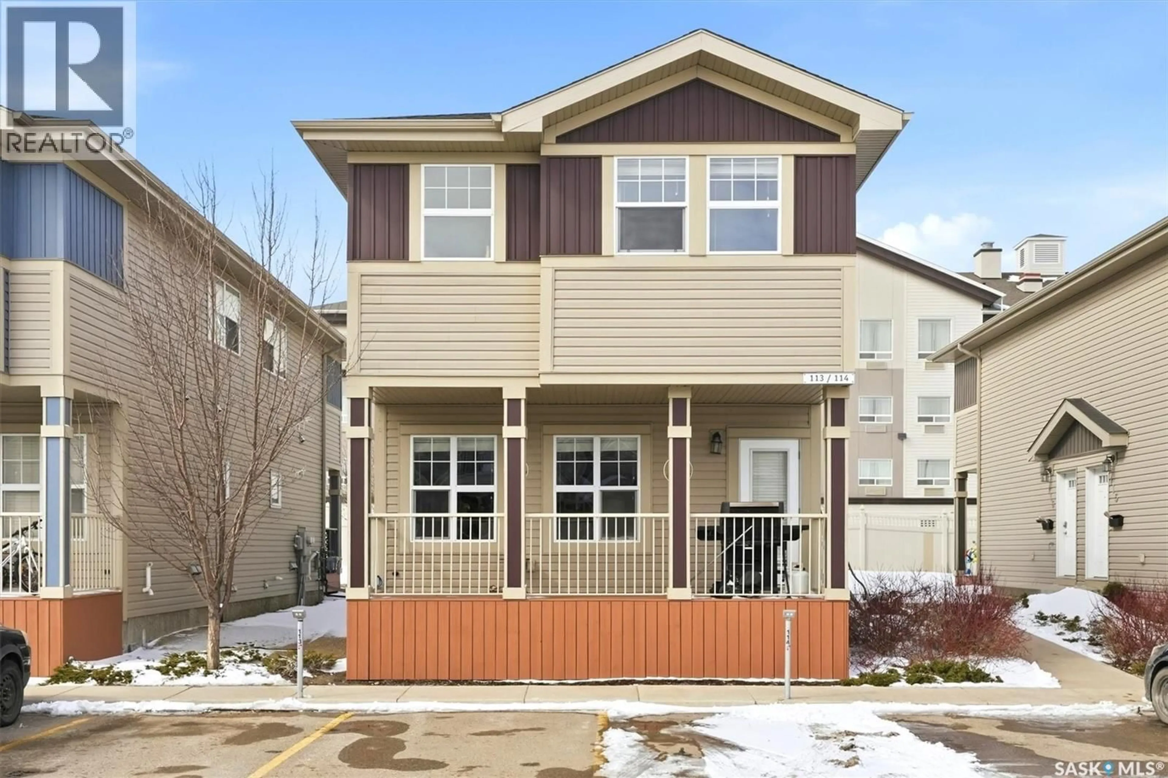 Home with vinyl exterior material, street for 100 - 114 CHAPARRAL BOULEVARD, Martensville Saskatchewan S0K0A2