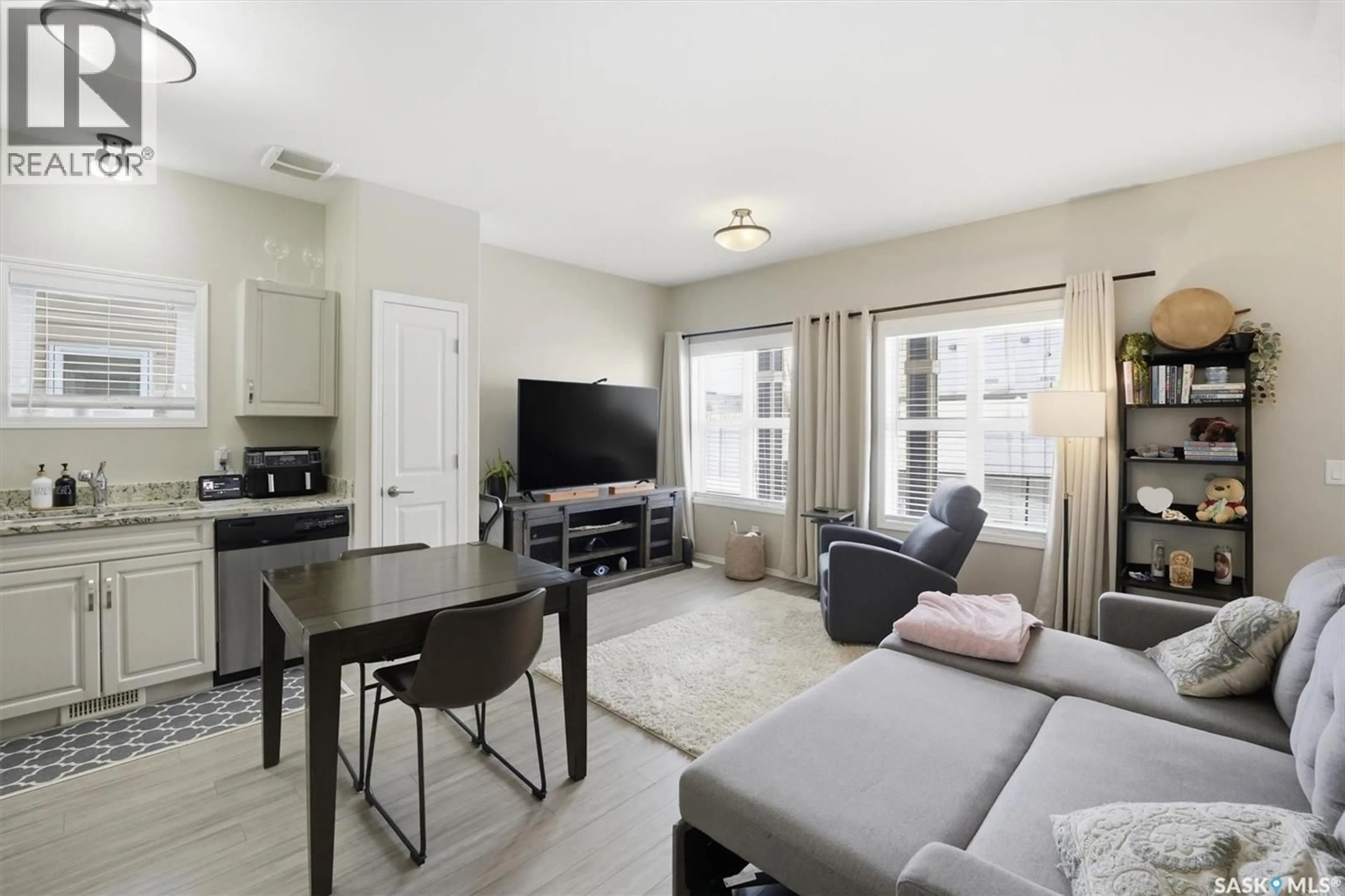 Living room with furniture, unknown for 100 - 114 CHAPARRAL BOULEVARD, Martensville Saskatchewan S0K0A2