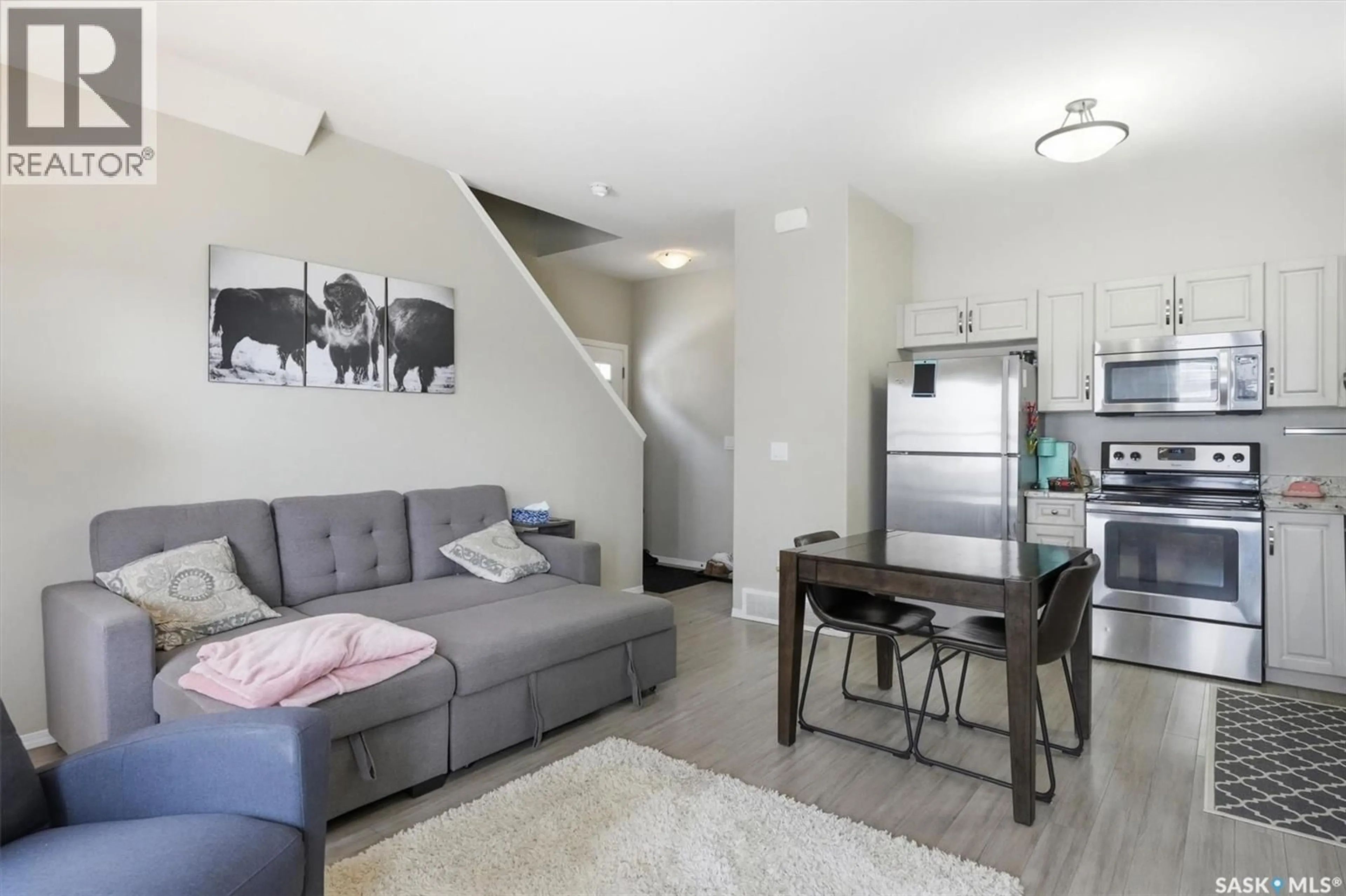 Living room with furniture, unknown for 100 - 114 CHAPARRAL BOULEVARD, Martensville Saskatchewan S0K0A2